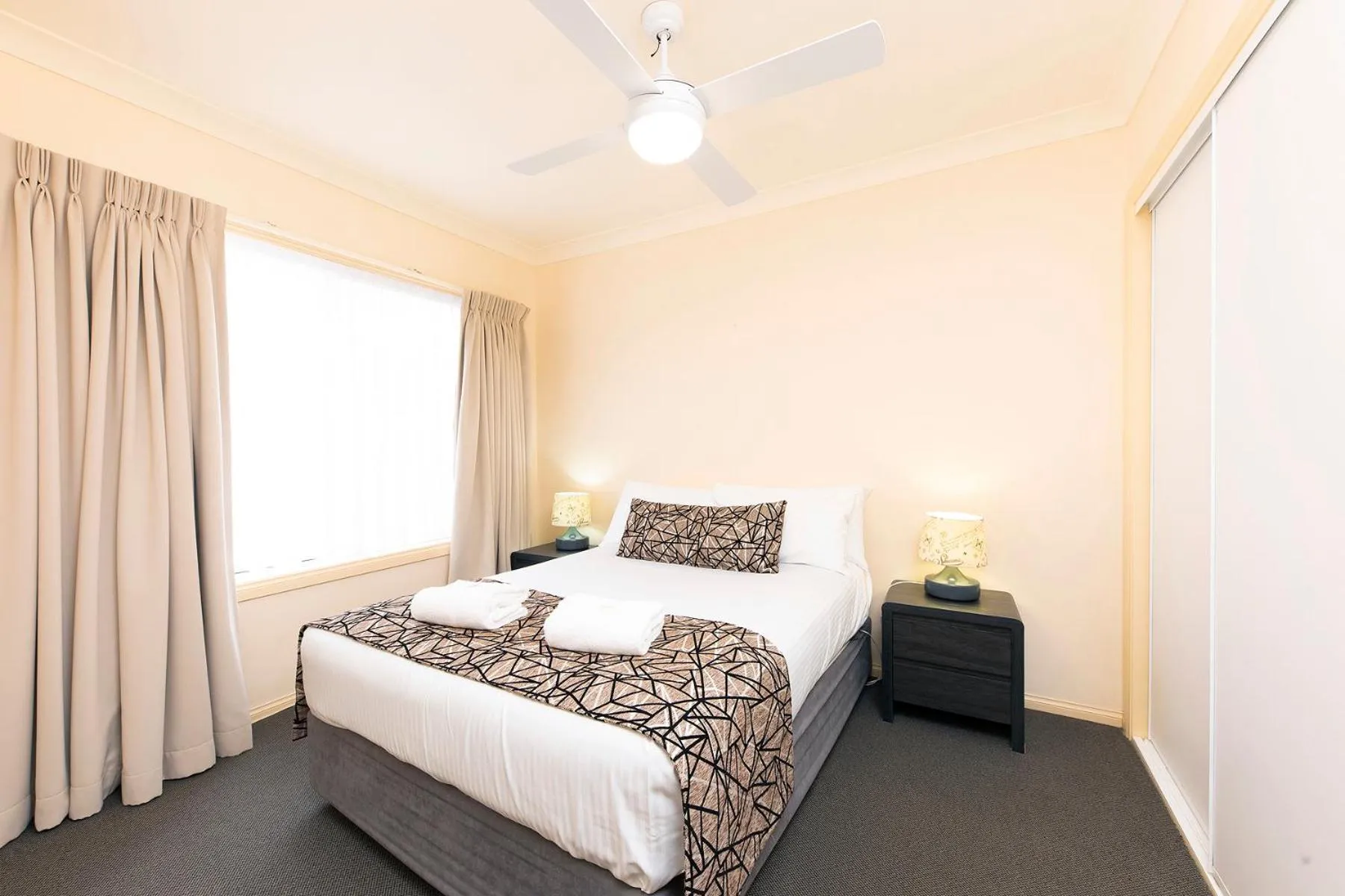 Bed in Meridian Beachside Apartments