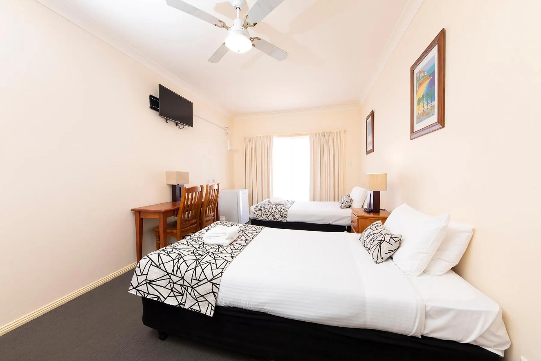 Bed in Meridian Beachside Apartments