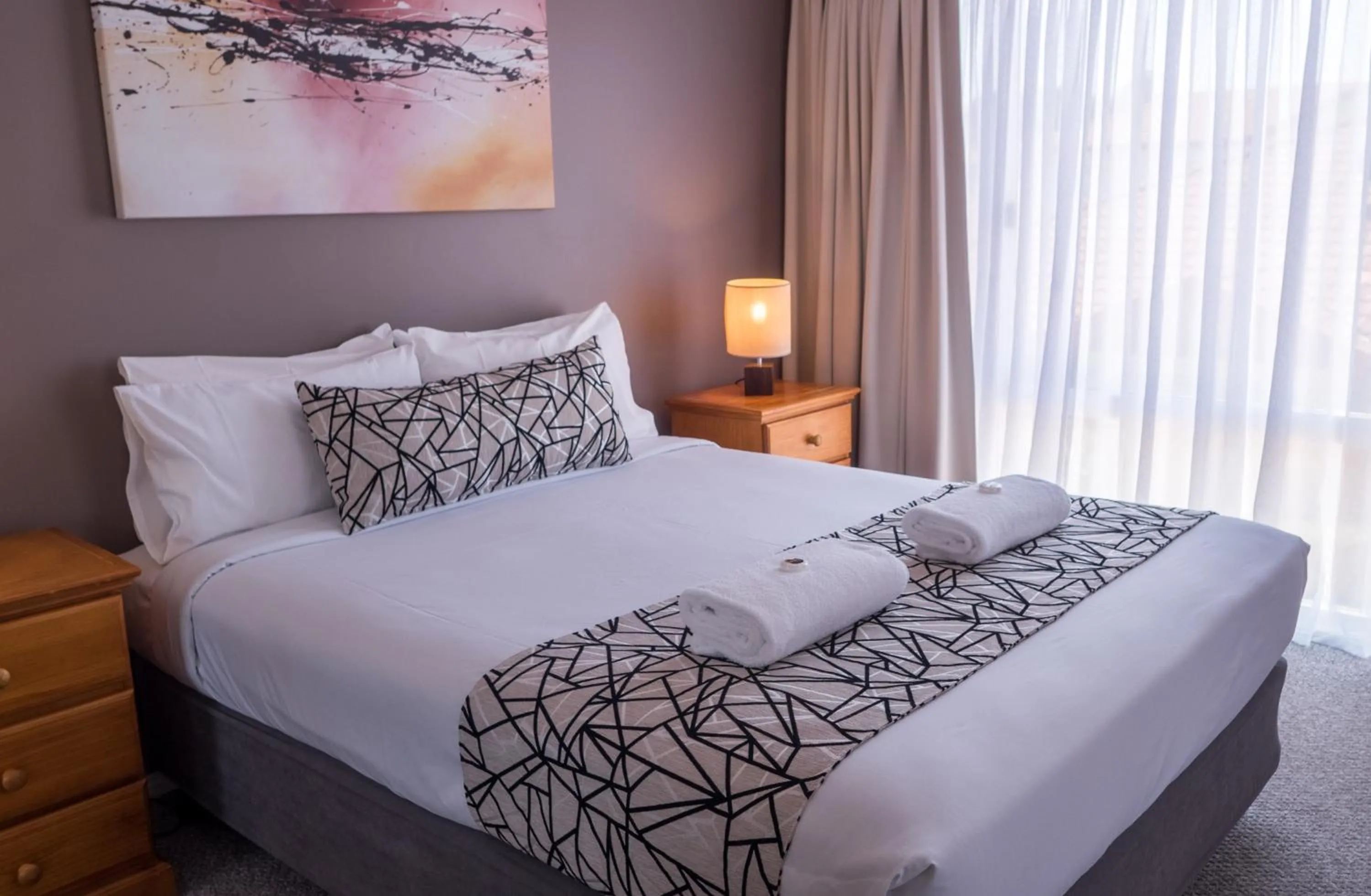 Bed in Meridian Beachside Apartments