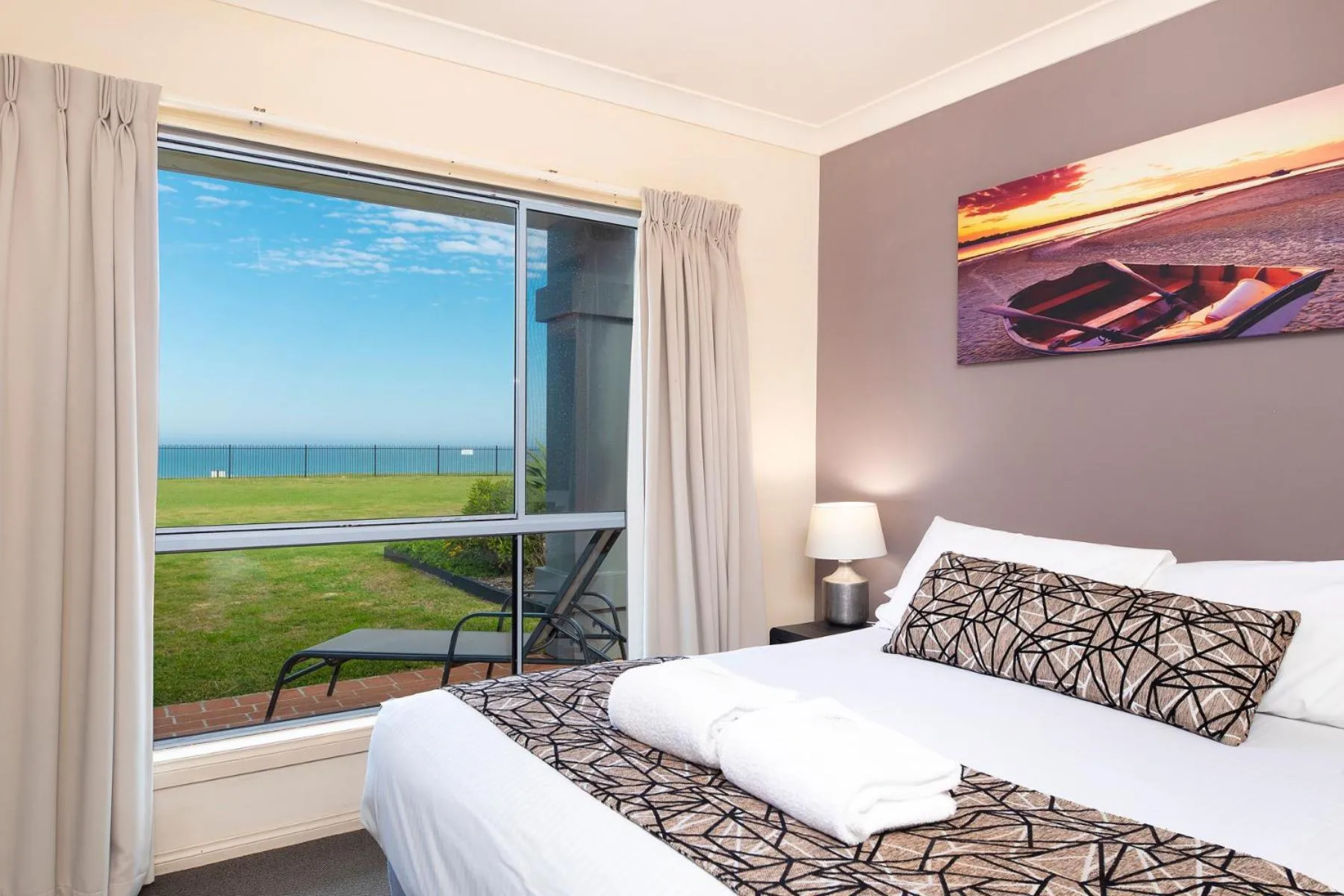 Bed in Meridian Beachside Apartments