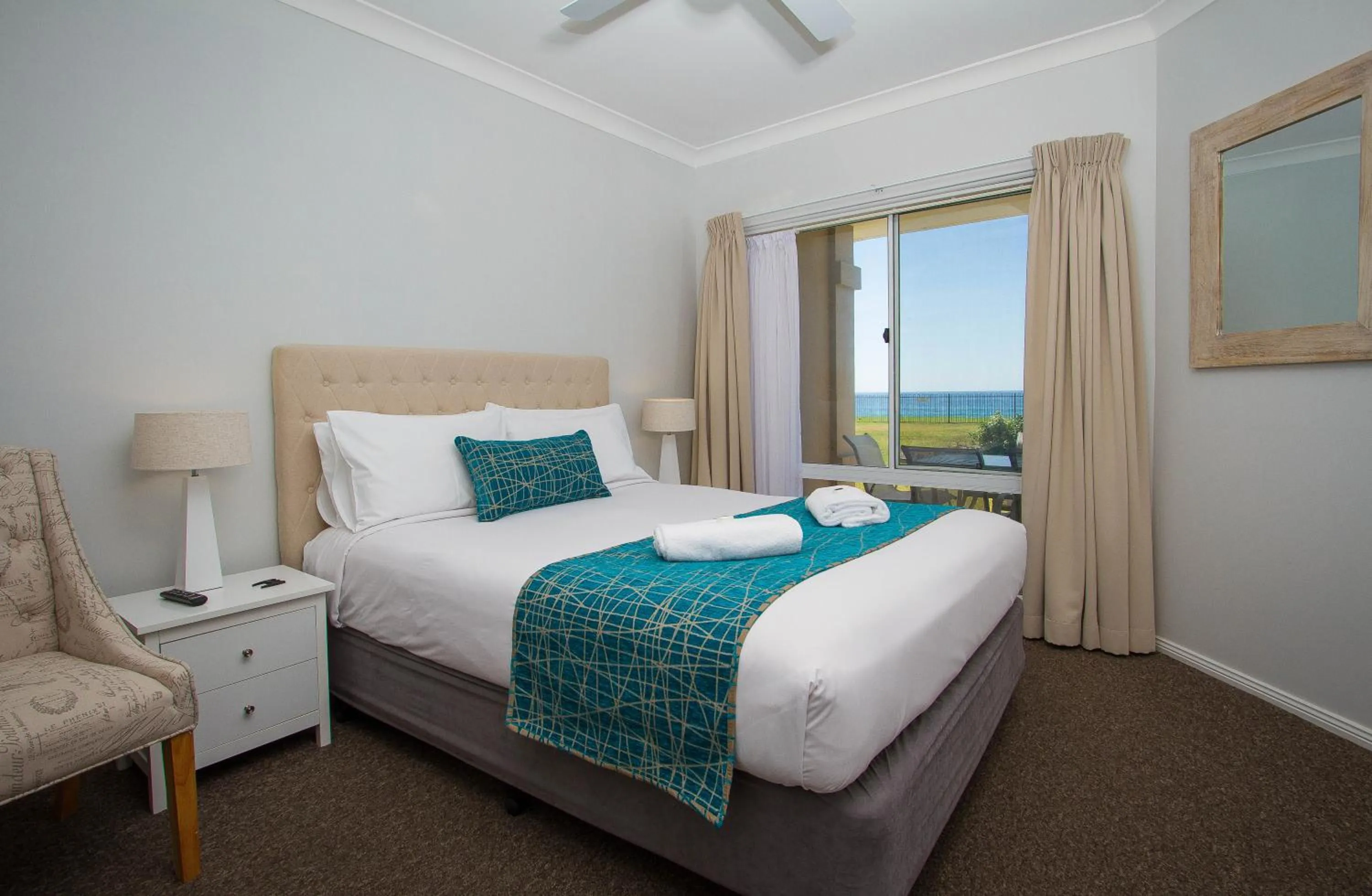 Bed in Meridian Beachside Apartments