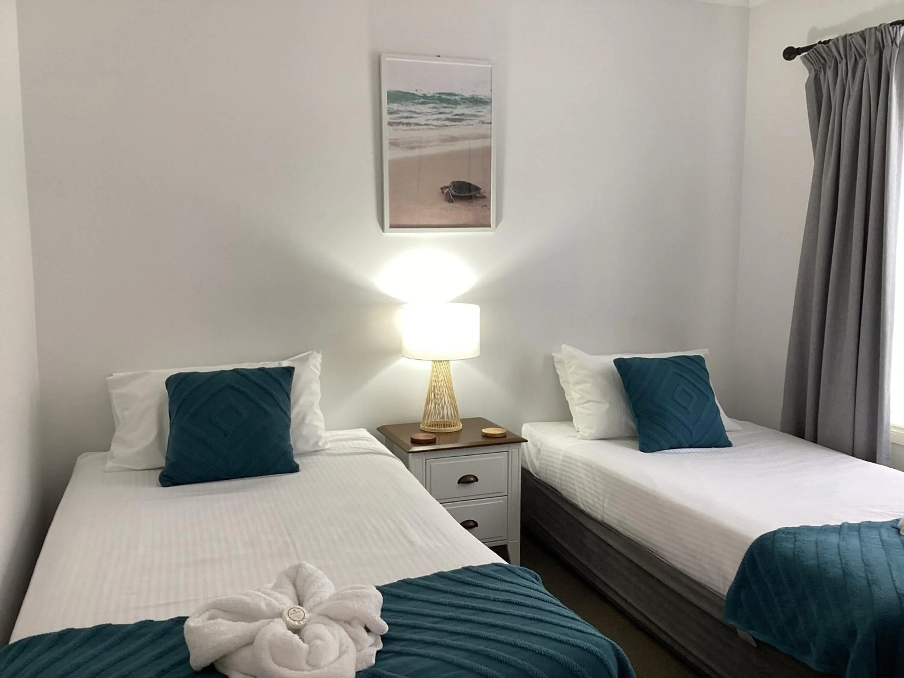 Bed in Meridian Beachside Apartments