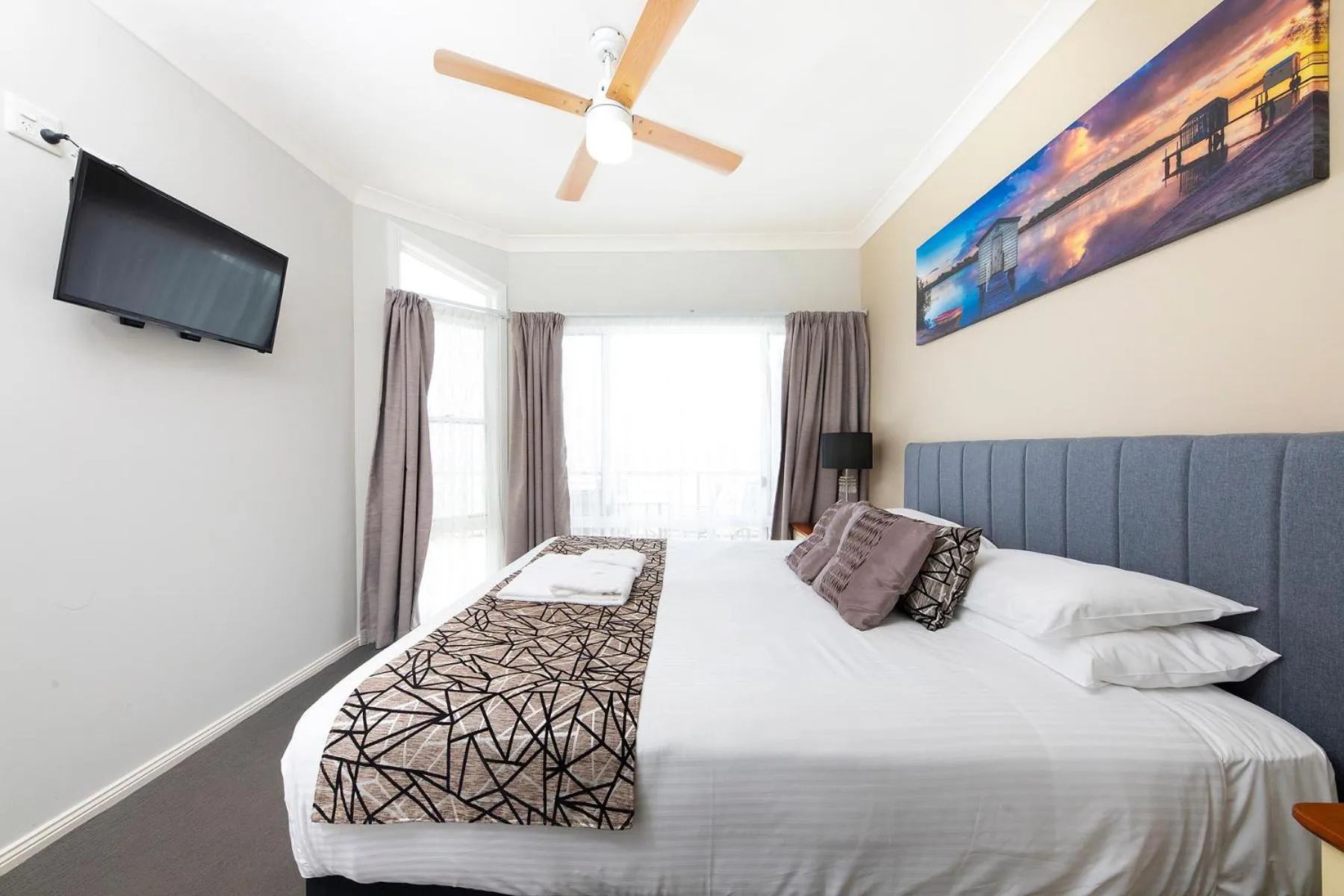 Bed in Meridian Beachside Apartments