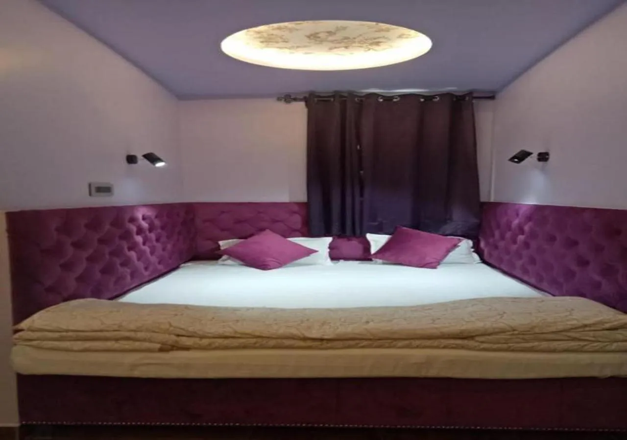 Bed in Maya Hotel & Restaurant