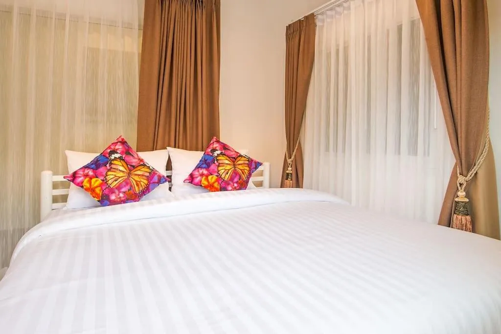 Bed in Aonang Sweet Pool Villa