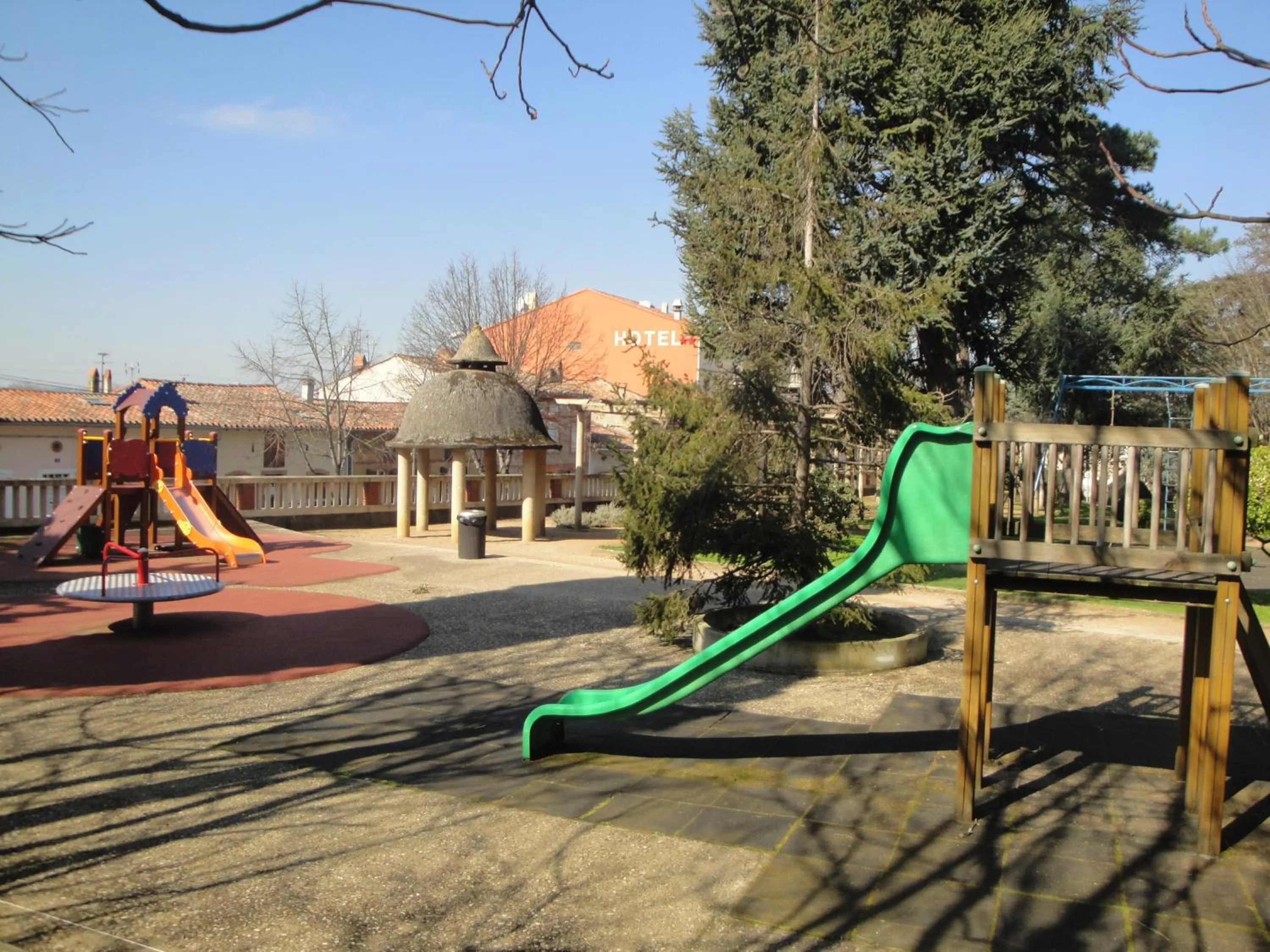 Children play ground in Hôtel Restaurant du Lauragais LOGIS DE FRANCE