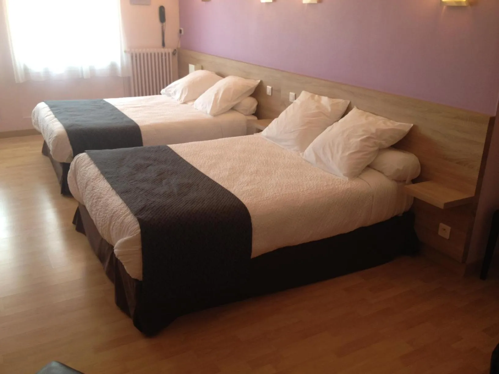 Photo of the whole room, Bed in Hôtel Restaurant du Lauragais LOGIS DE FRANCE