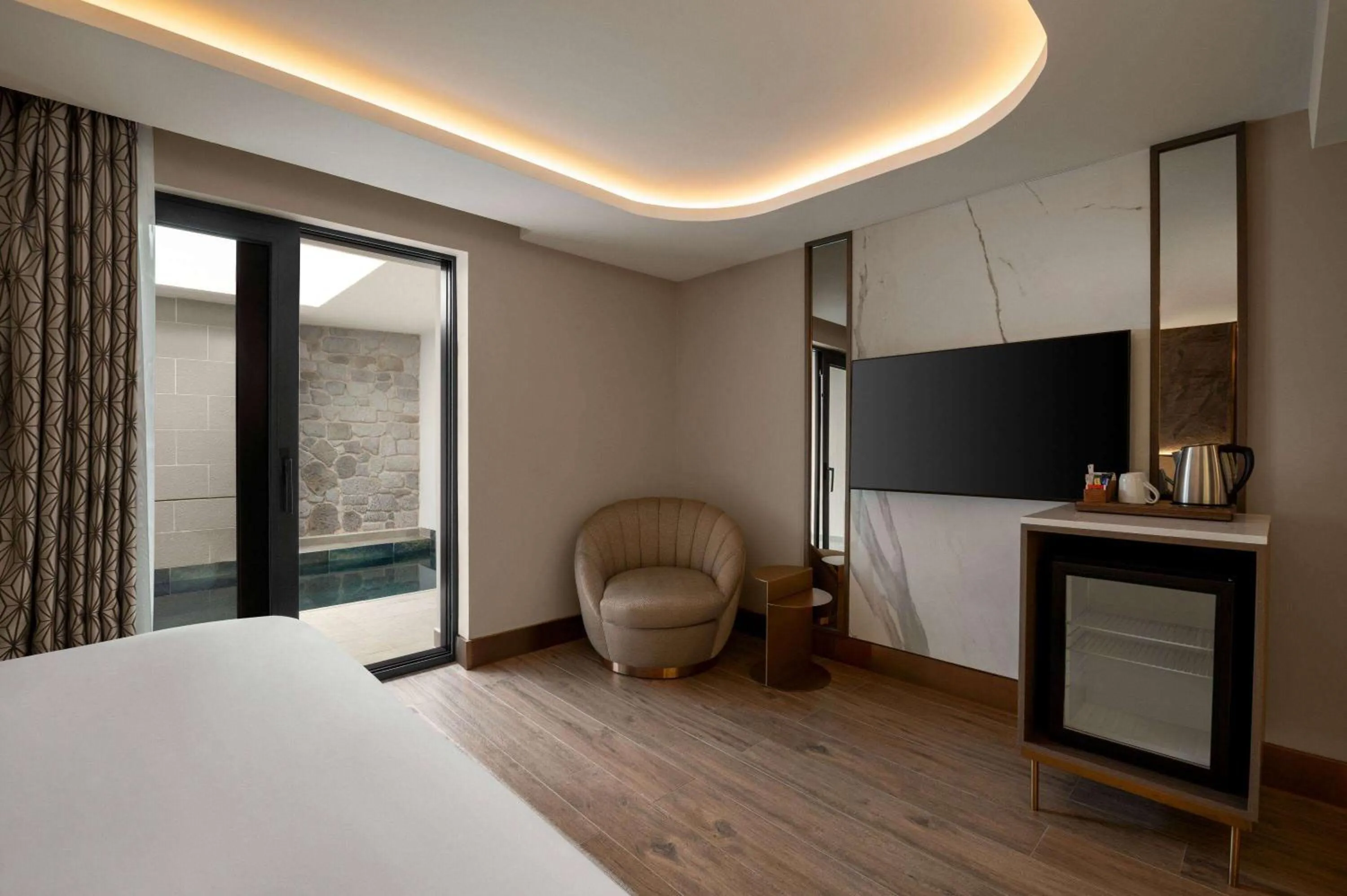 Photo of the whole room, Bed in Boreas Hotel & SPA, Trademark Collection by Wyndham