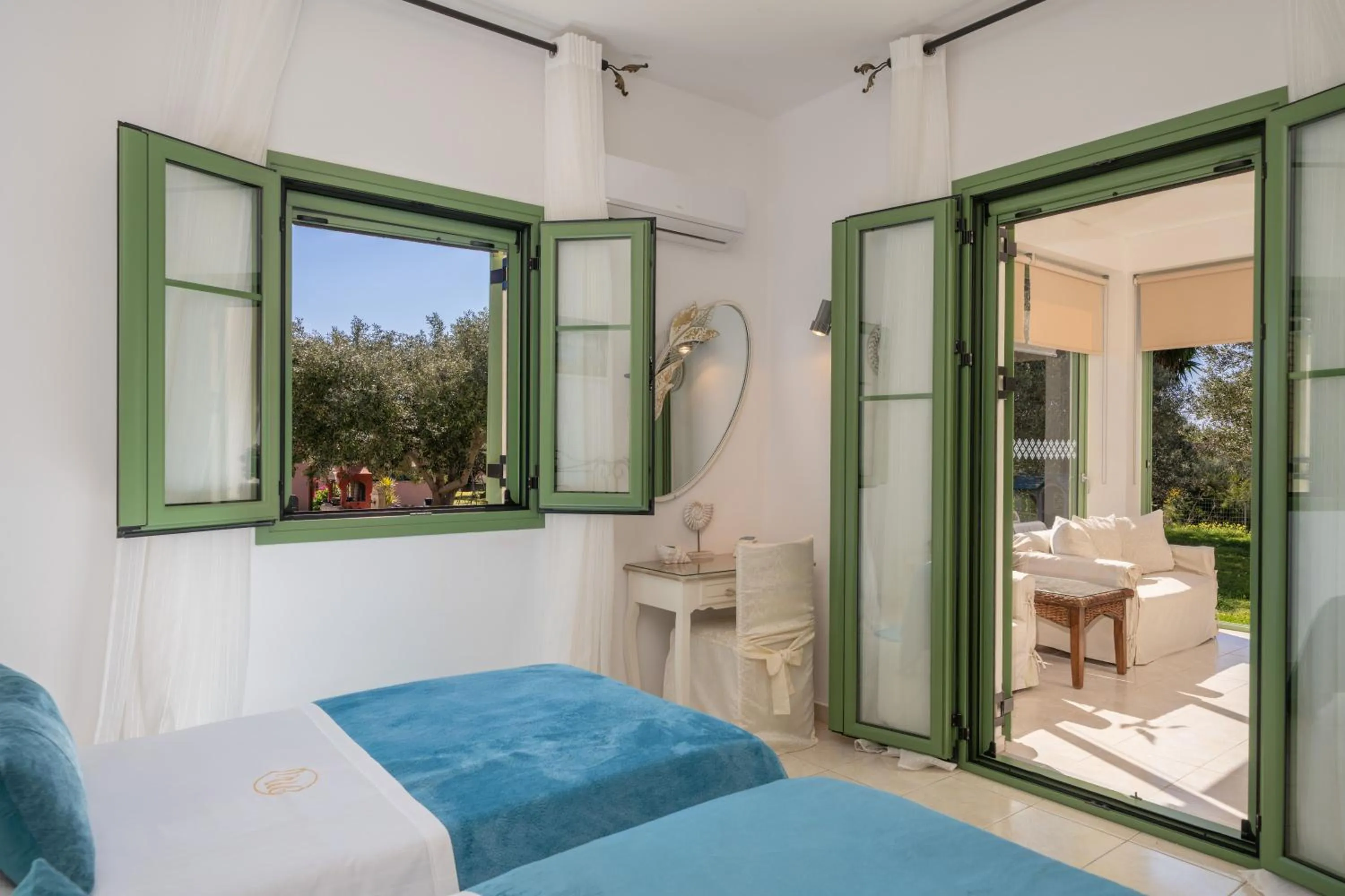 Bed in Monambeles Villas