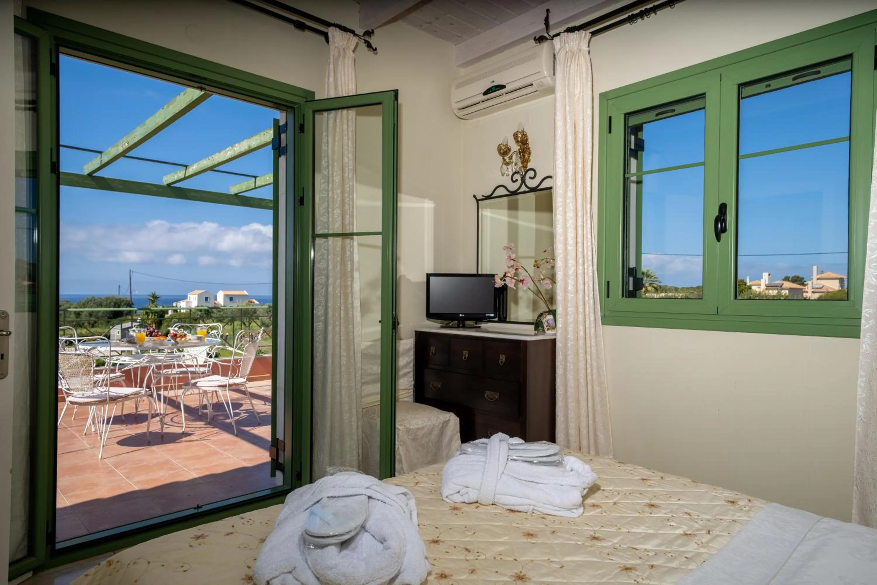 Bed in Monambeles Villas