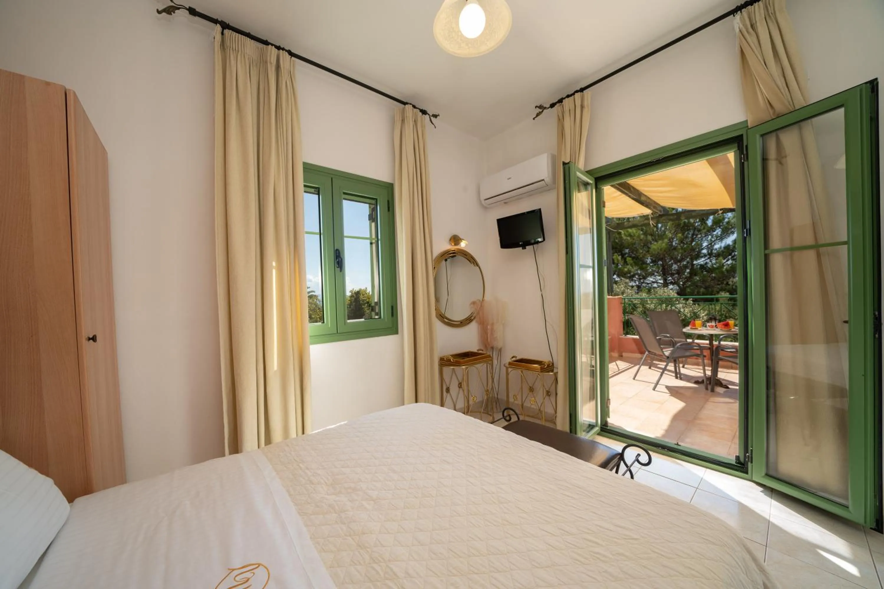Bed in Monambeles Villas