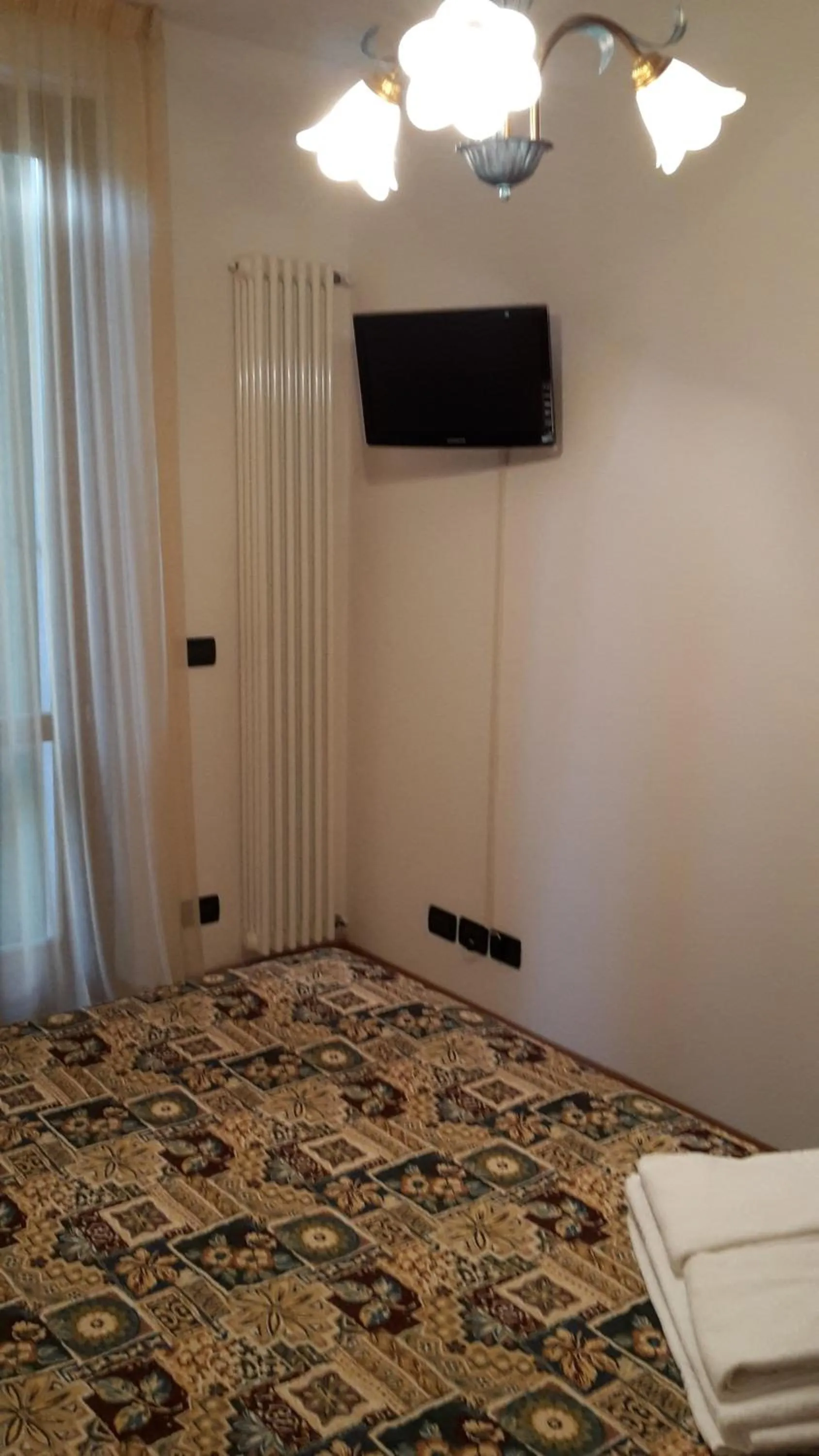 Decorative detail, Bed in Residenza Orchidee