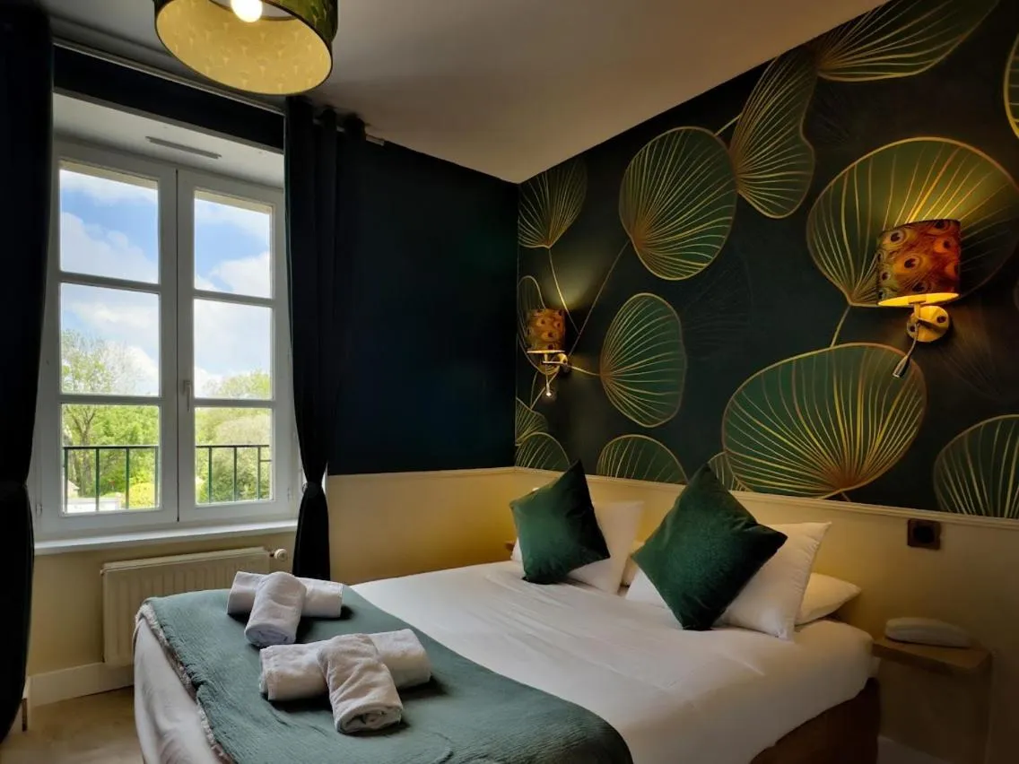 Bed in Logis Le Prieuré