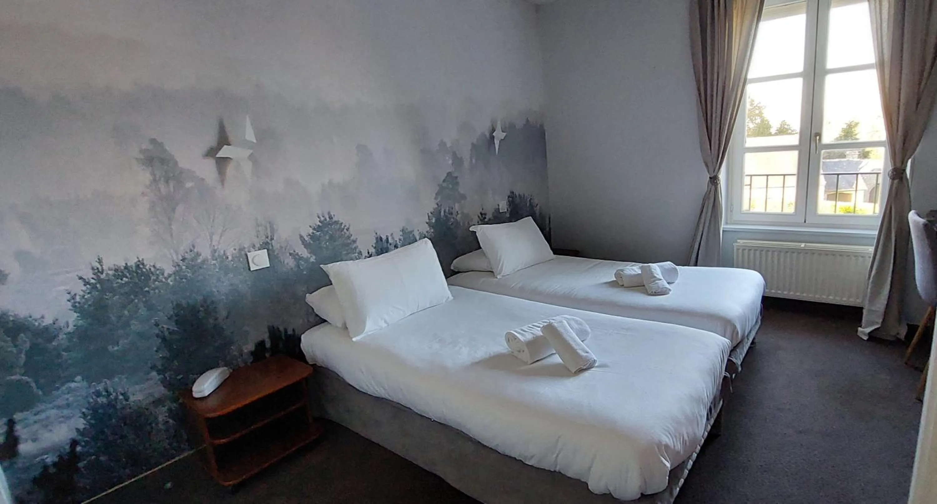 Bed in Logis Le Prieuré