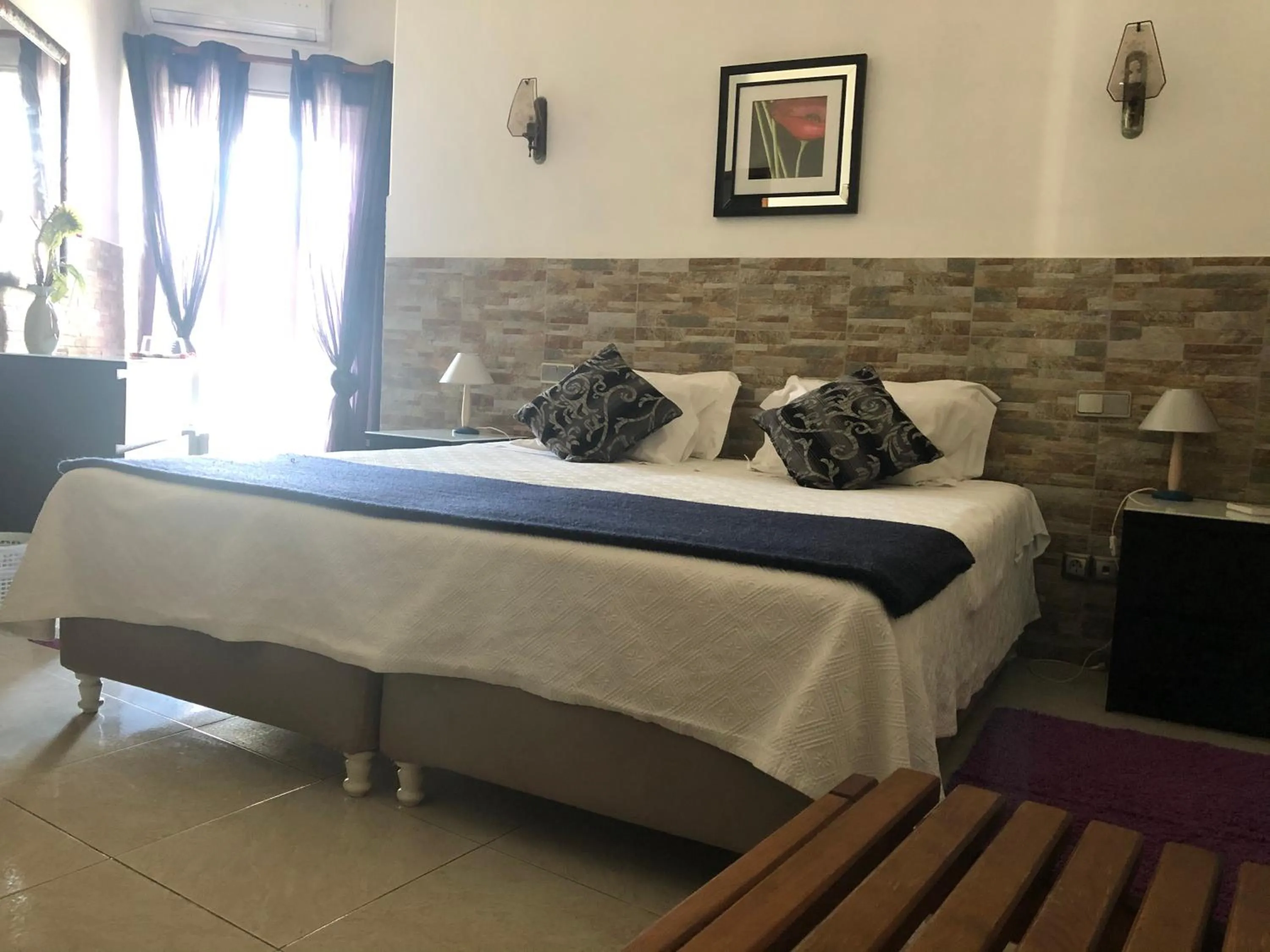 Bed in Apartamentos e Quartos Atalaia