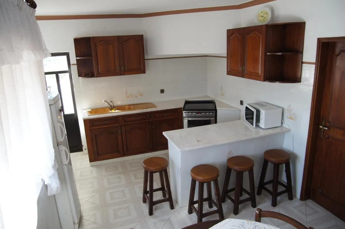 Kitchen or kitchenette in Apartamentos e Quartos Atalaia