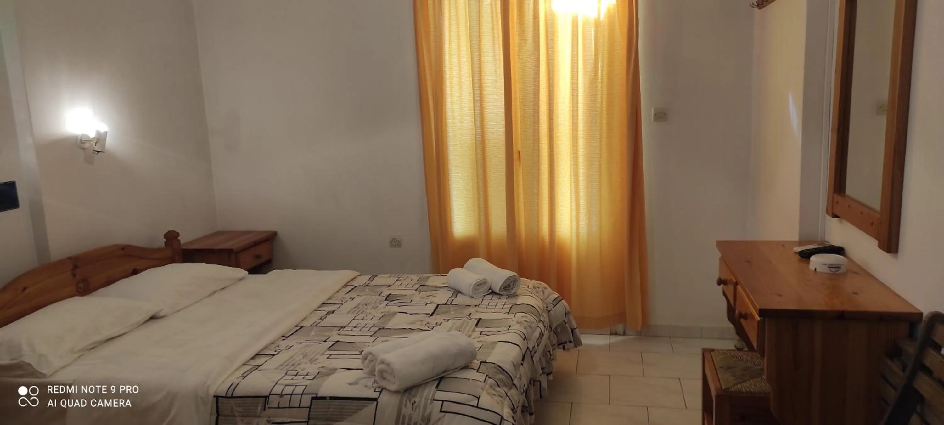 Bed in Loukia Apartments & Studios