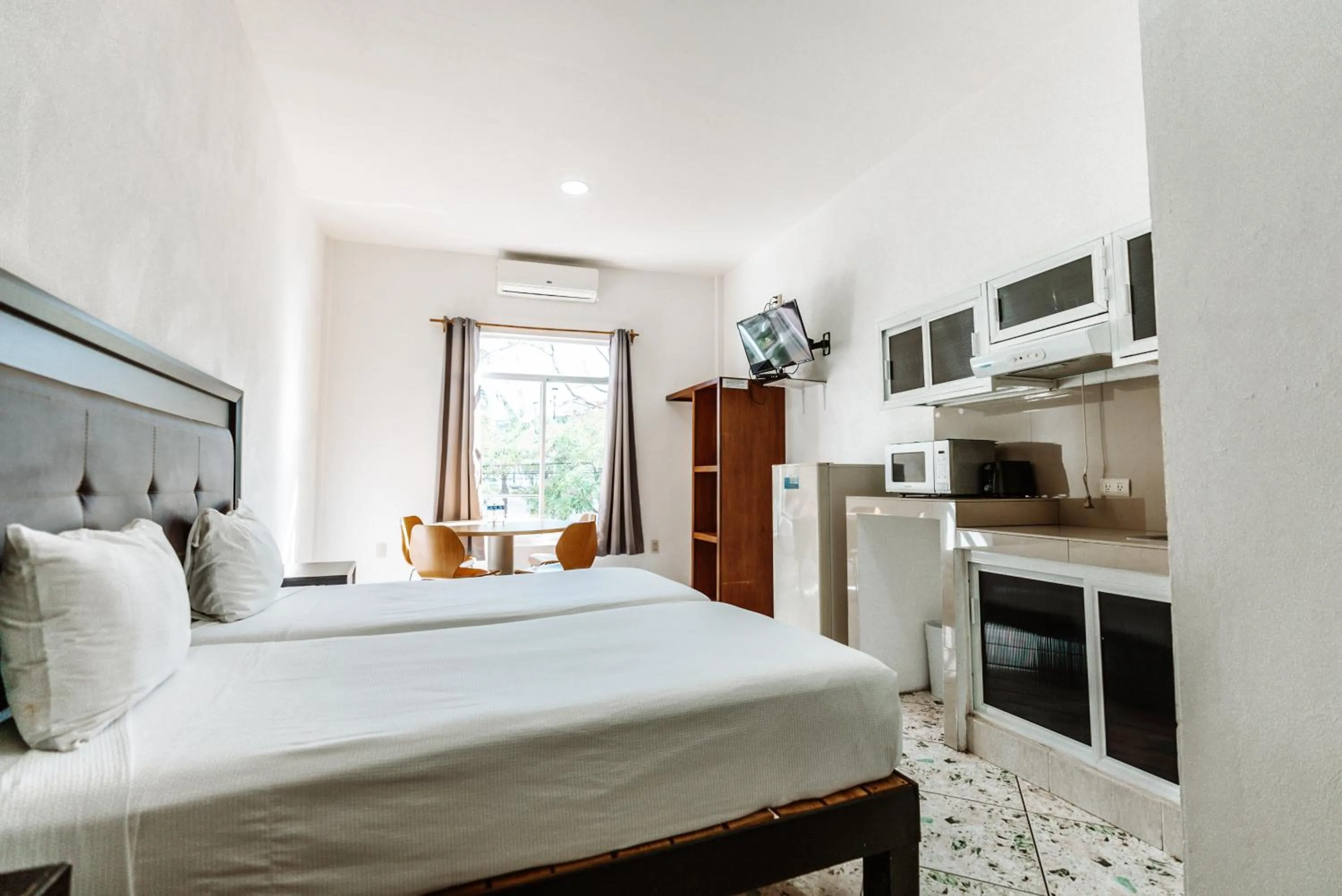 Photo of the whole room, Bed in Loft Hotel Malecón Vallarta