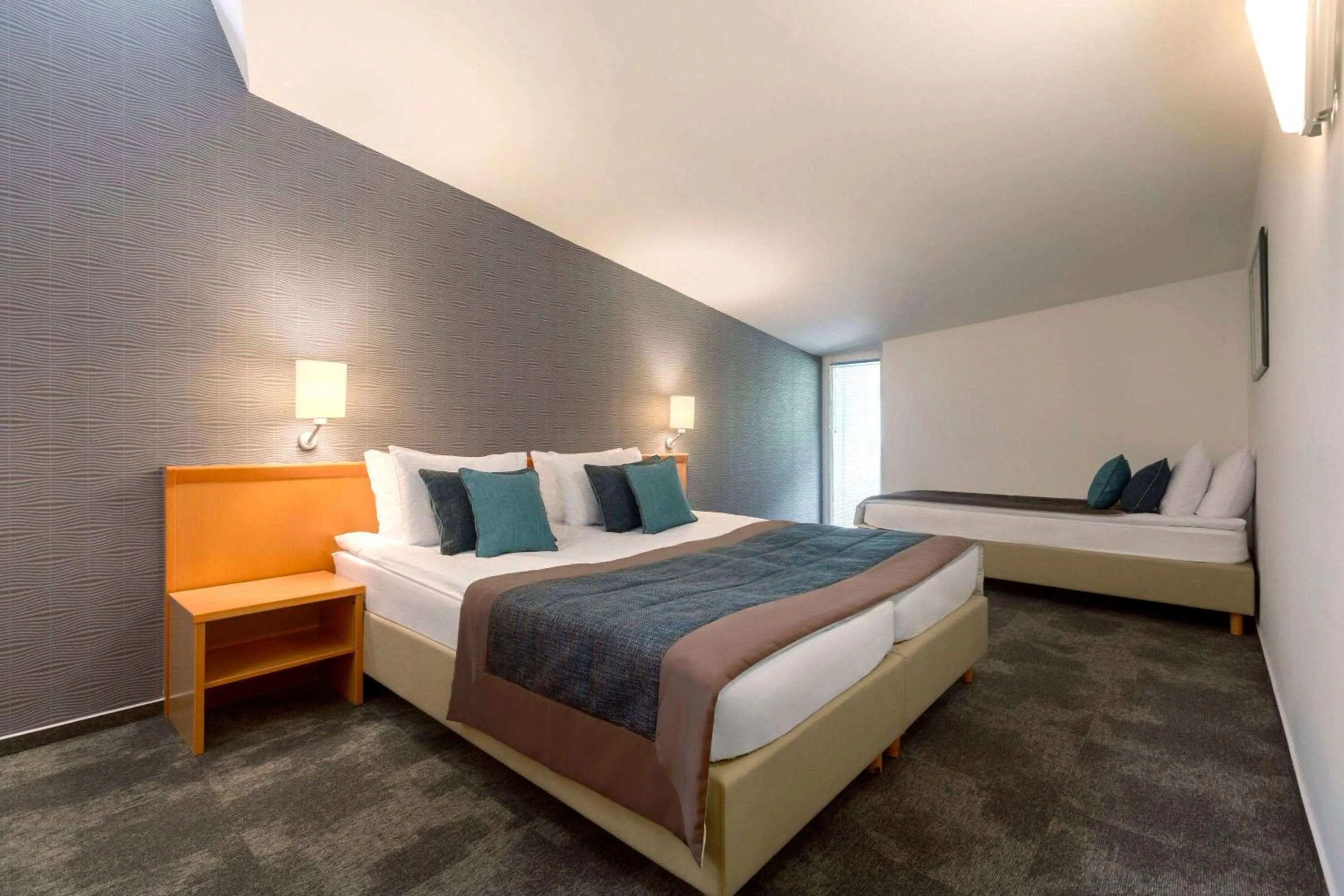 Photo of the whole room, Bed in Ramada Resort Kranjska Gora