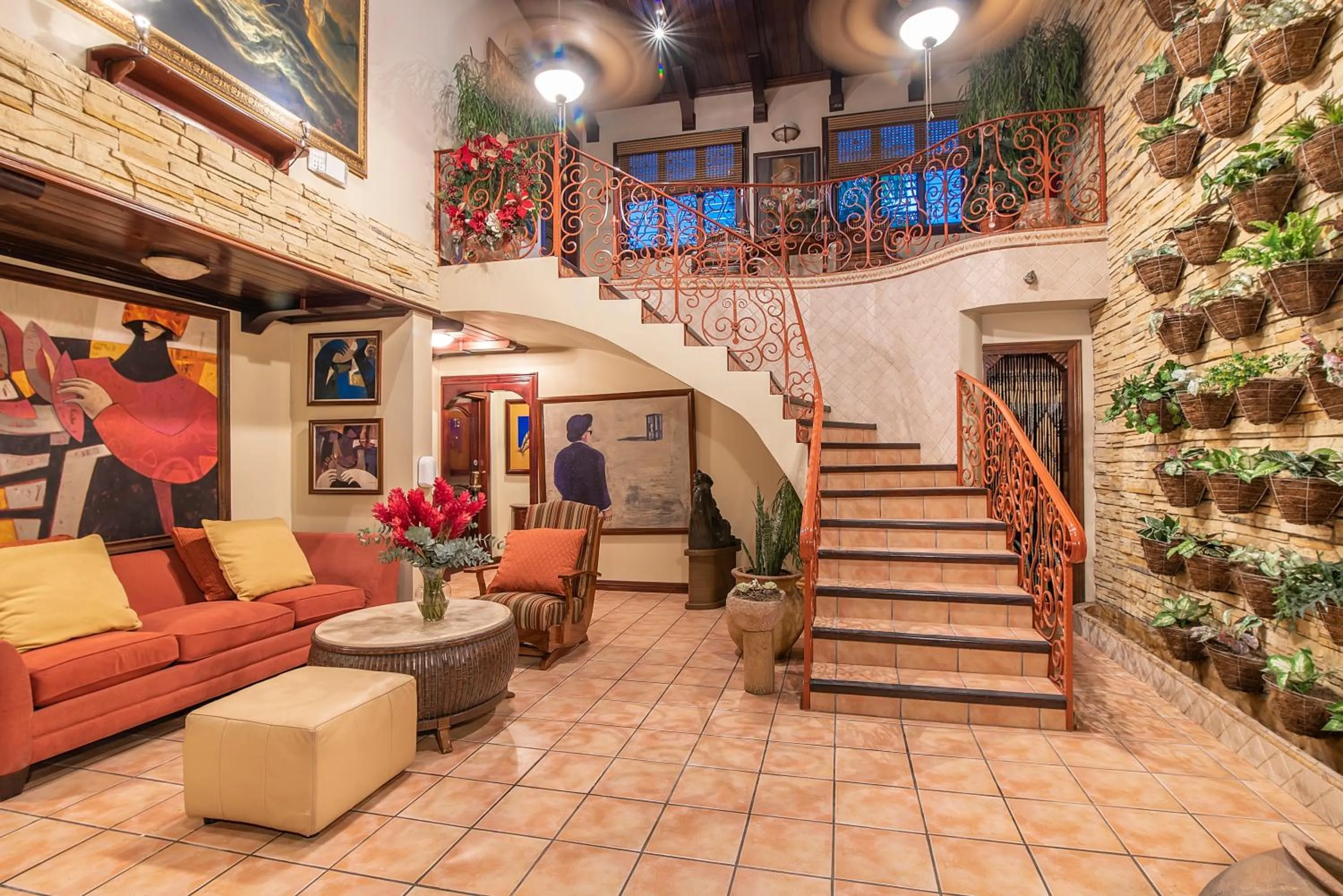 Living room in Hotel Casa Roland San Jose