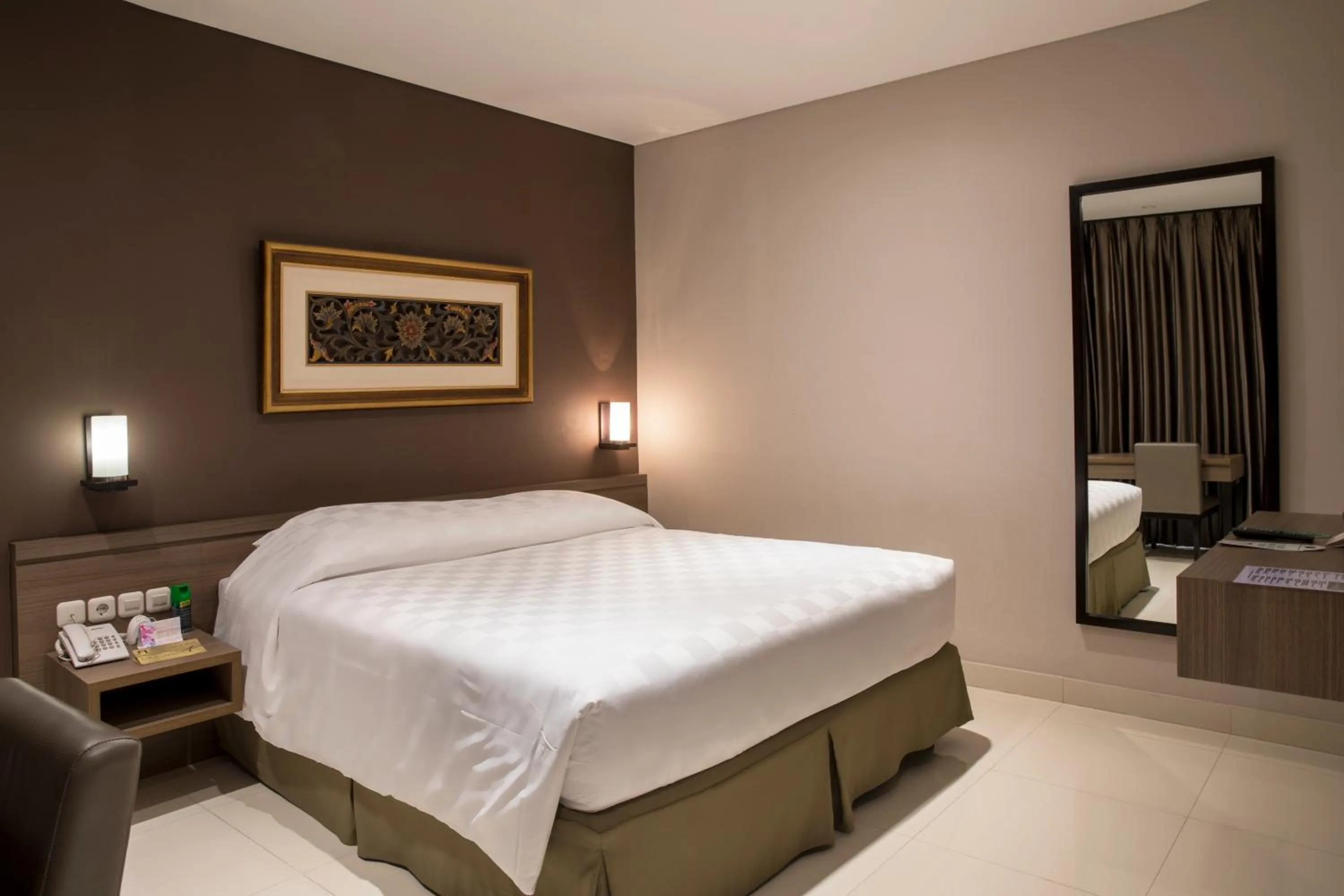 Bed in Mambruk Hotel & Convention