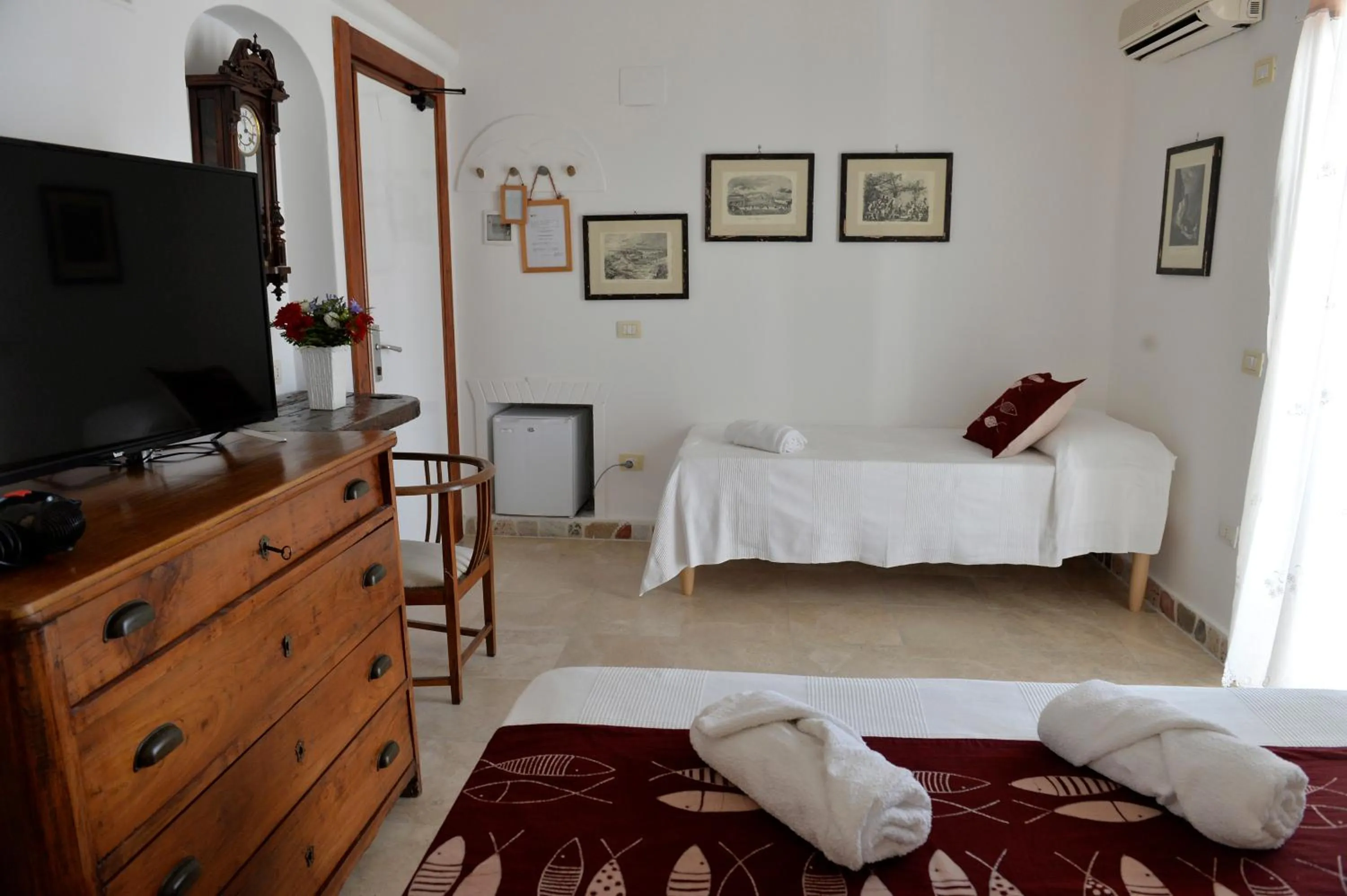 Bed in Piccolo Hotel Luisa