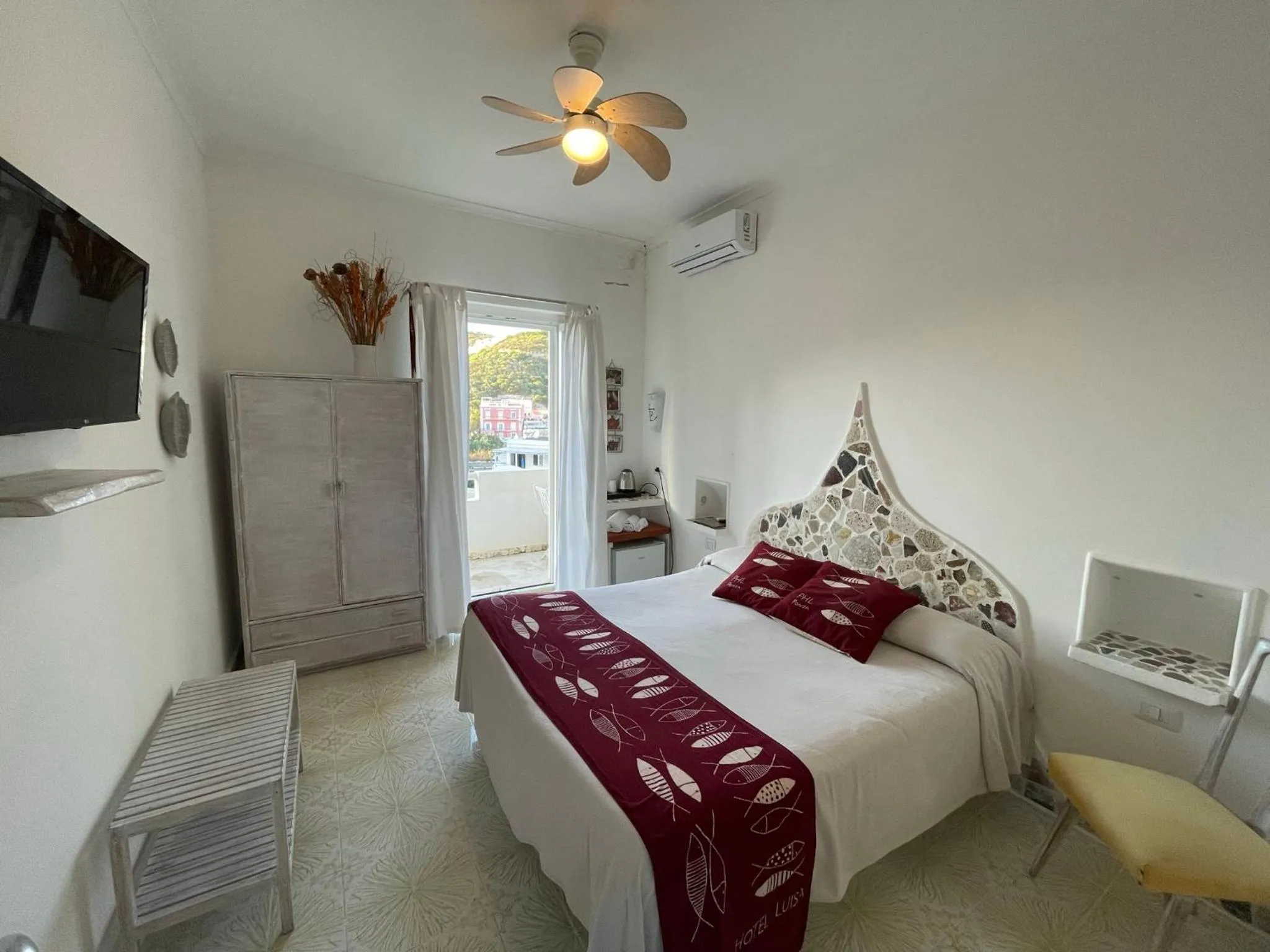 Bed in Piccolo Hotel Luisa