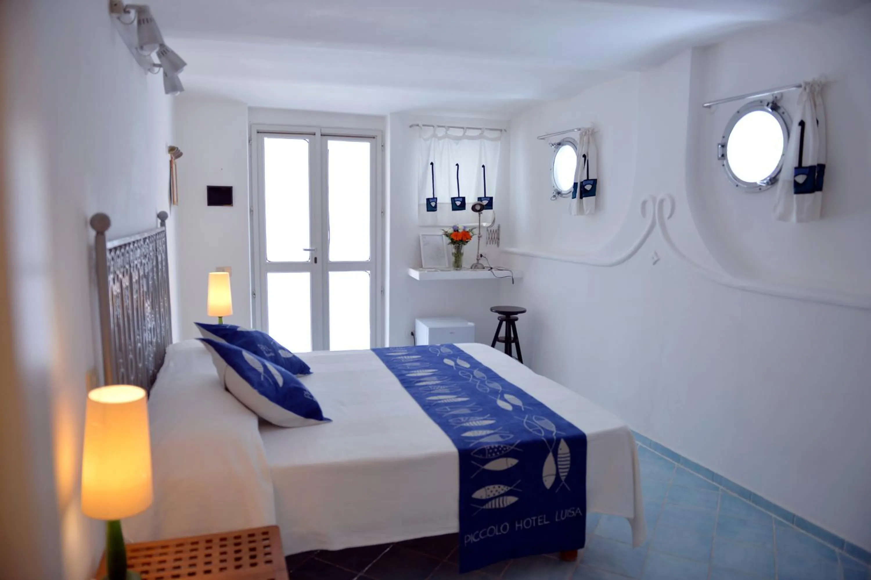 Bed in Piccolo Hotel Luisa