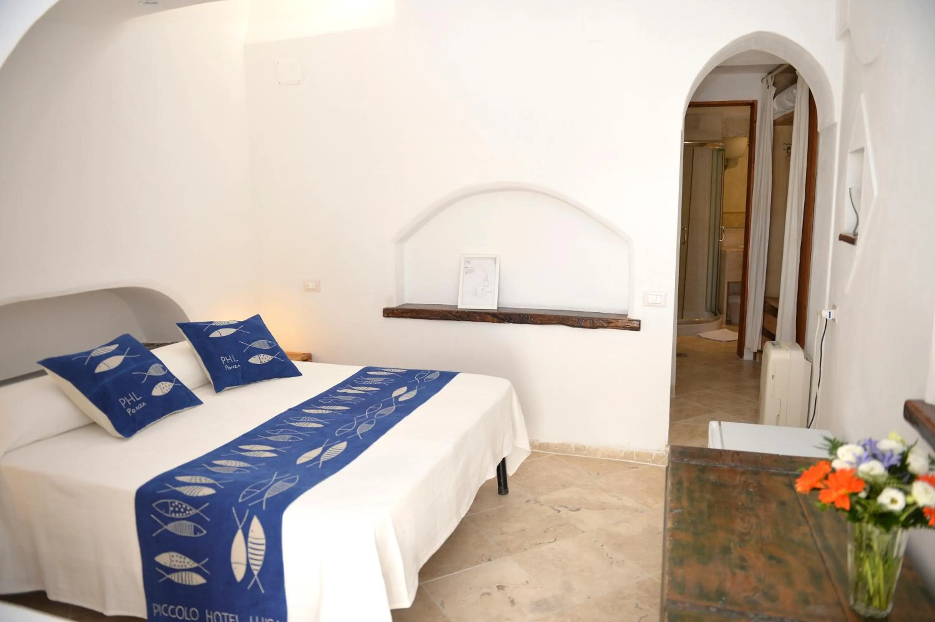 Bed in Piccolo Hotel Luisa