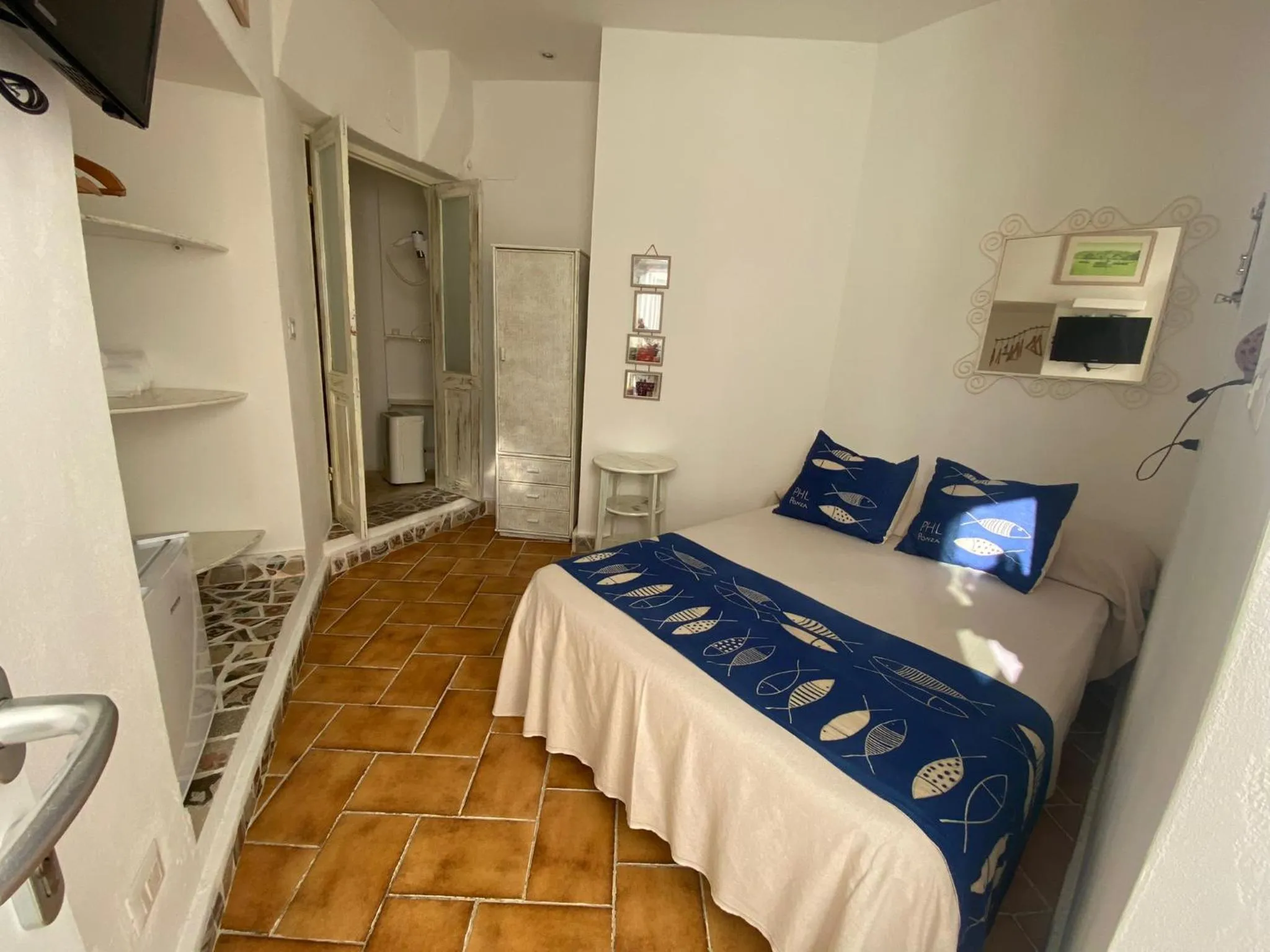 Bed in Piccolo Hotel Luisa