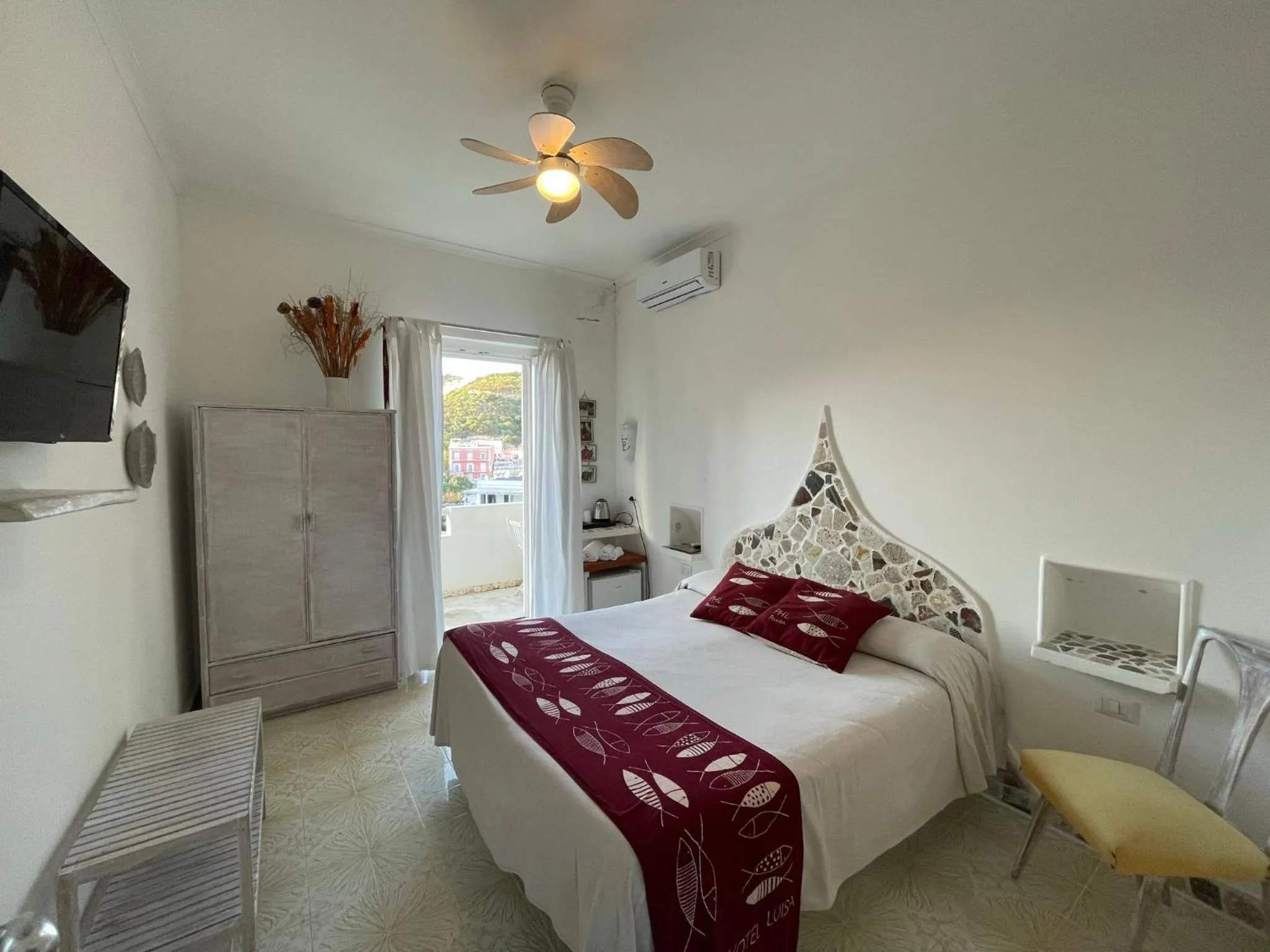 Bed in Piccolo Hotel Luisa