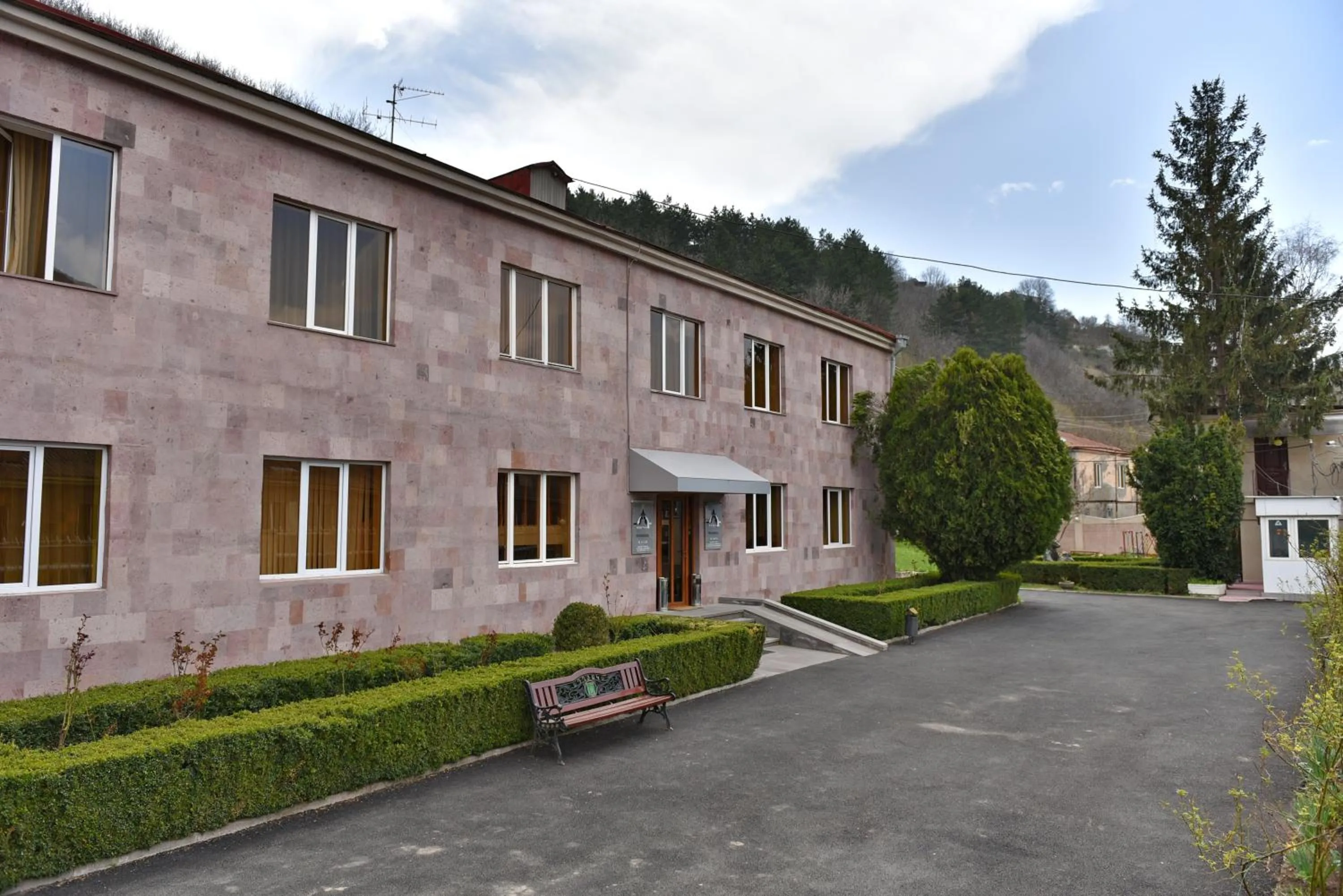 Facade/entrance in GreenWood Hotel