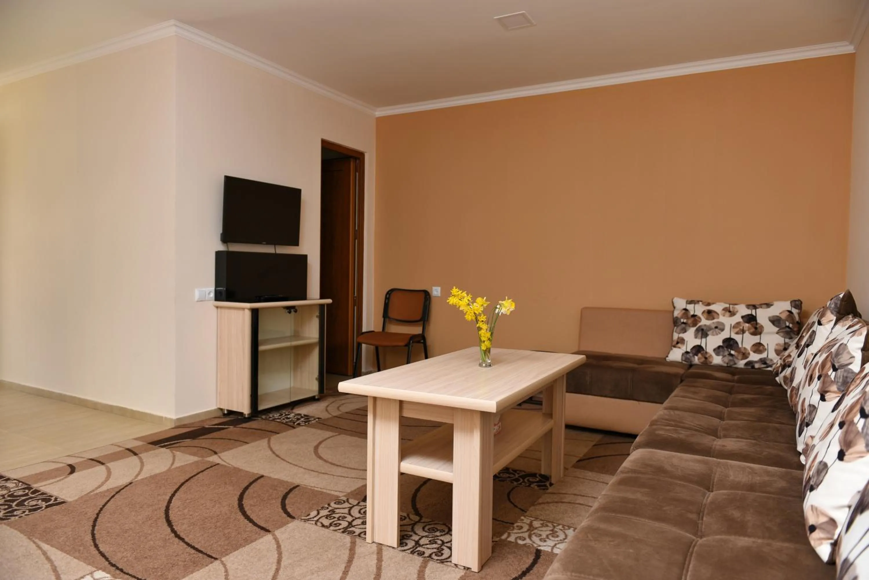 Seating area in GreenWood Hotel