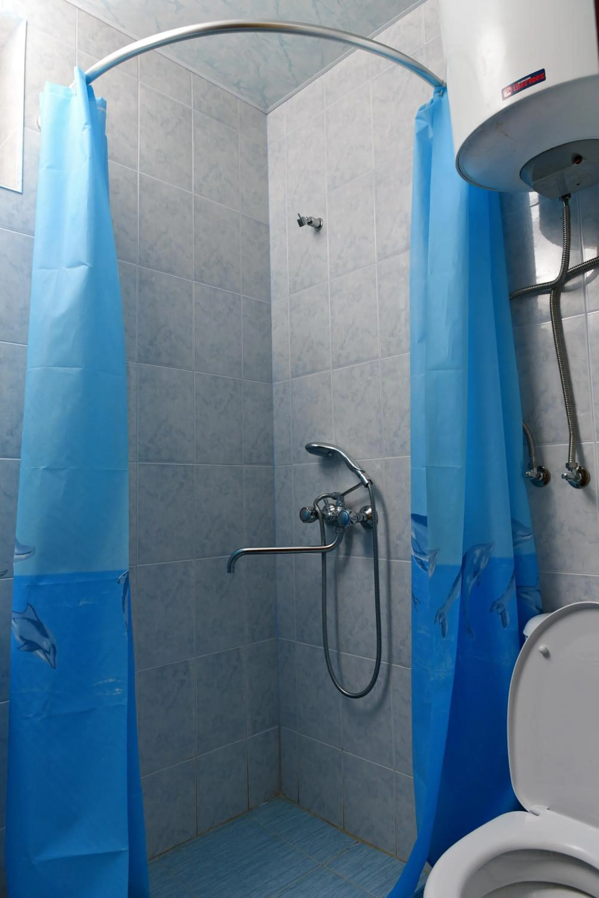 Shower in GreenWood Hotel