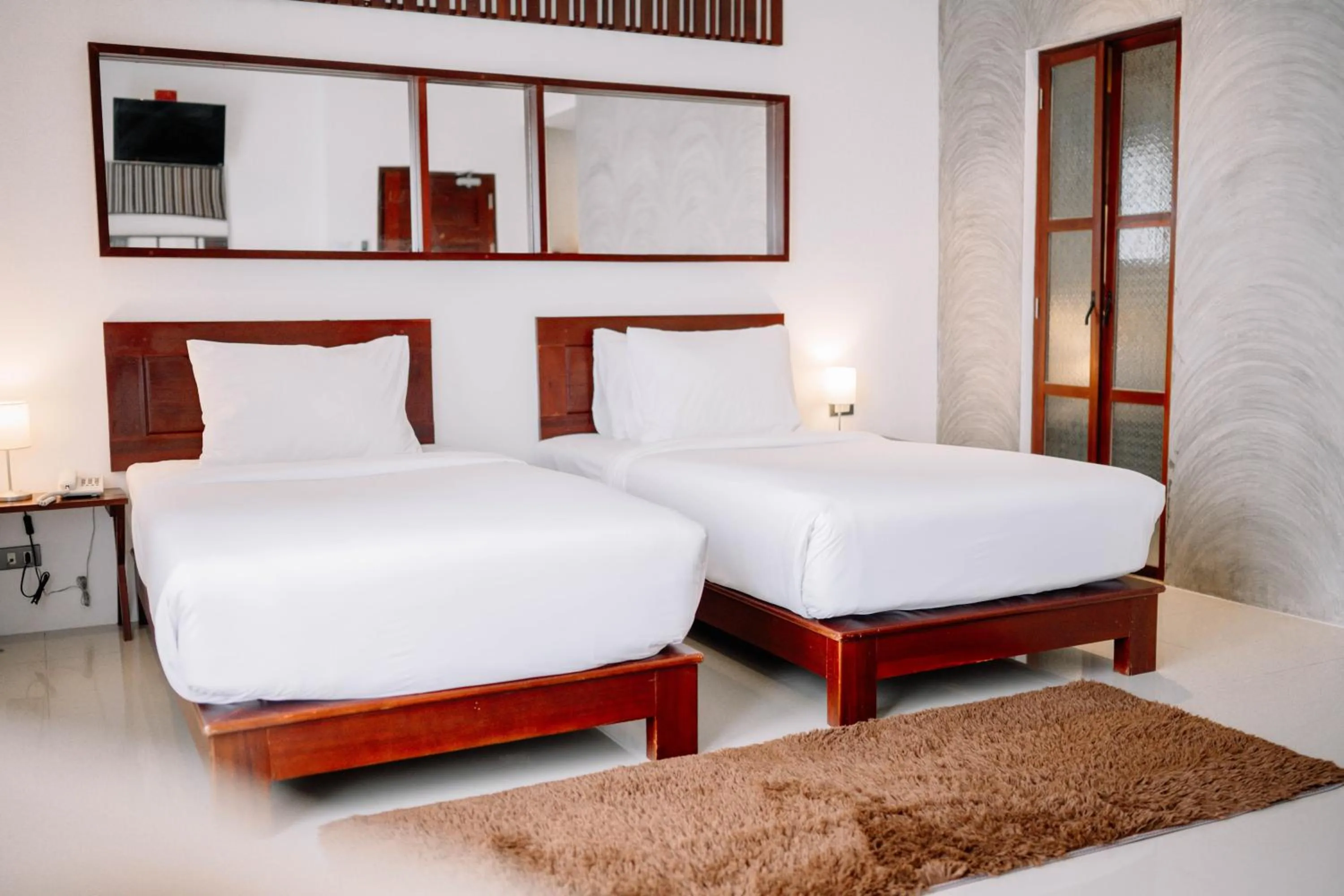 Bed in S 2 Modern Boutique Hotel