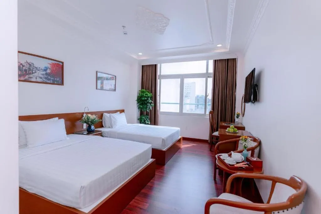 Bedroom, Bed in DAHLIALAND SAIGON HOTEL & SWIMMING PooL