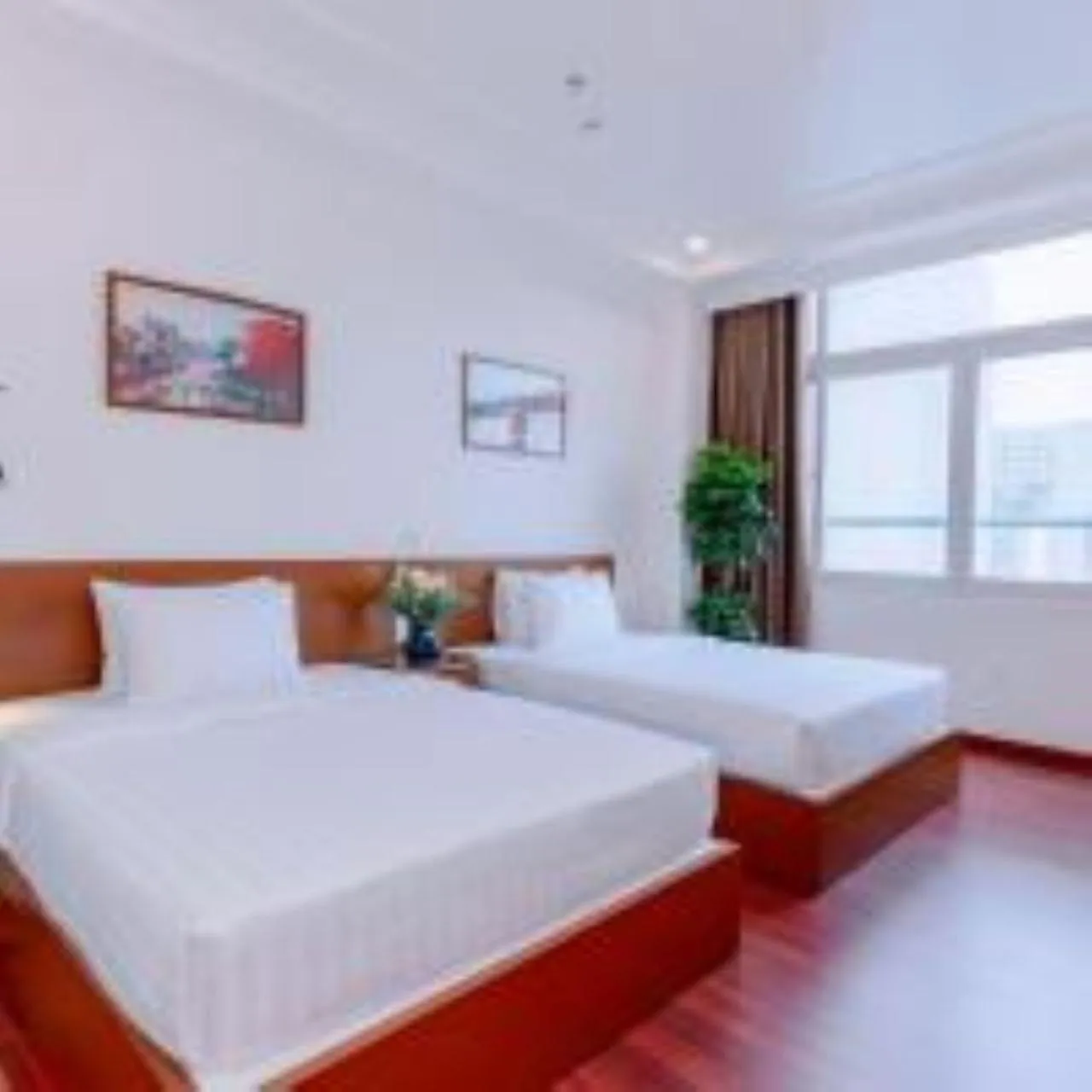 Bedroom, Bed in DAHLIALAND SAIGON HOTEL & SWIMMING PooL