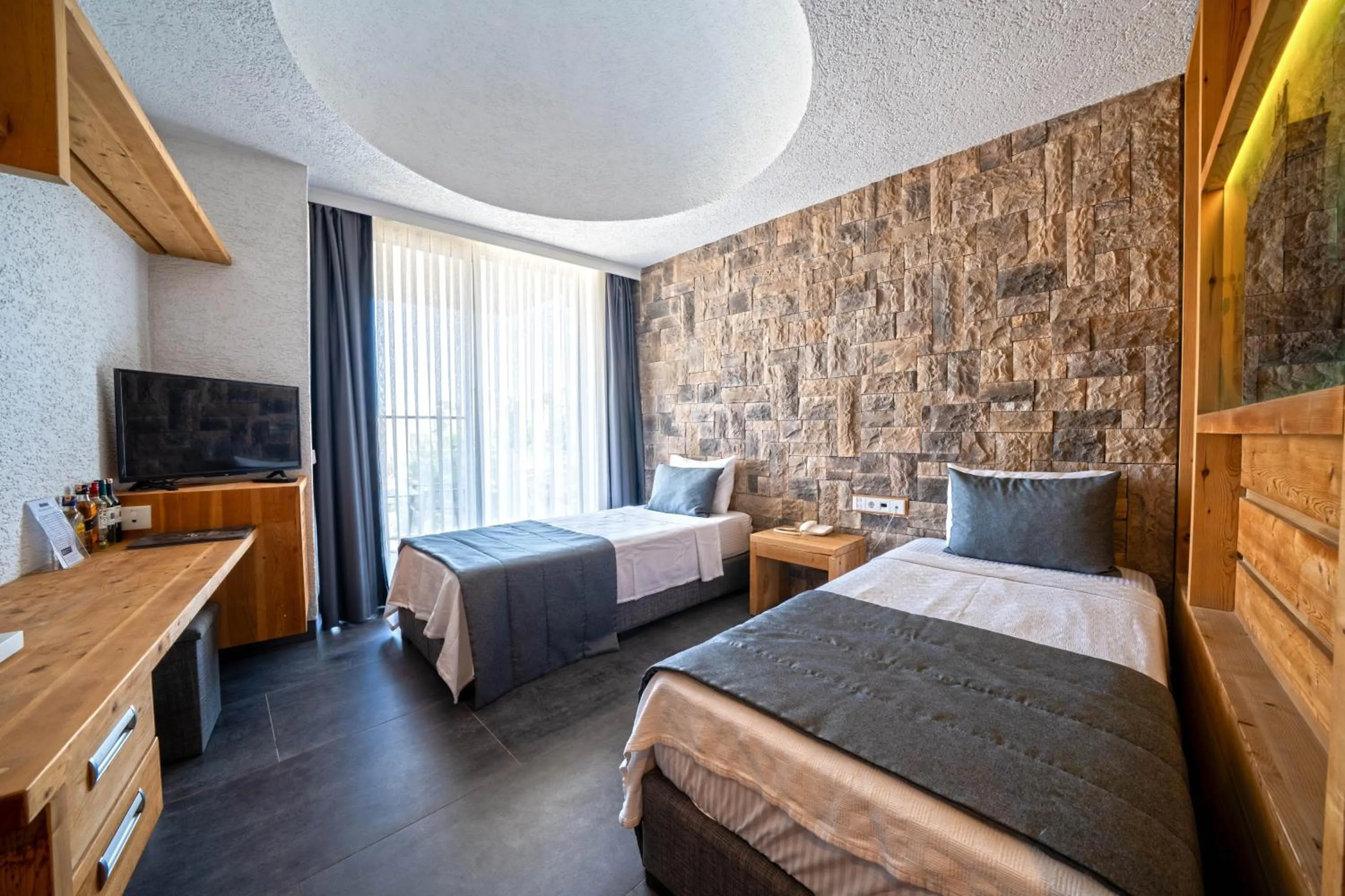 Bed in MyElla Boutique Hotel