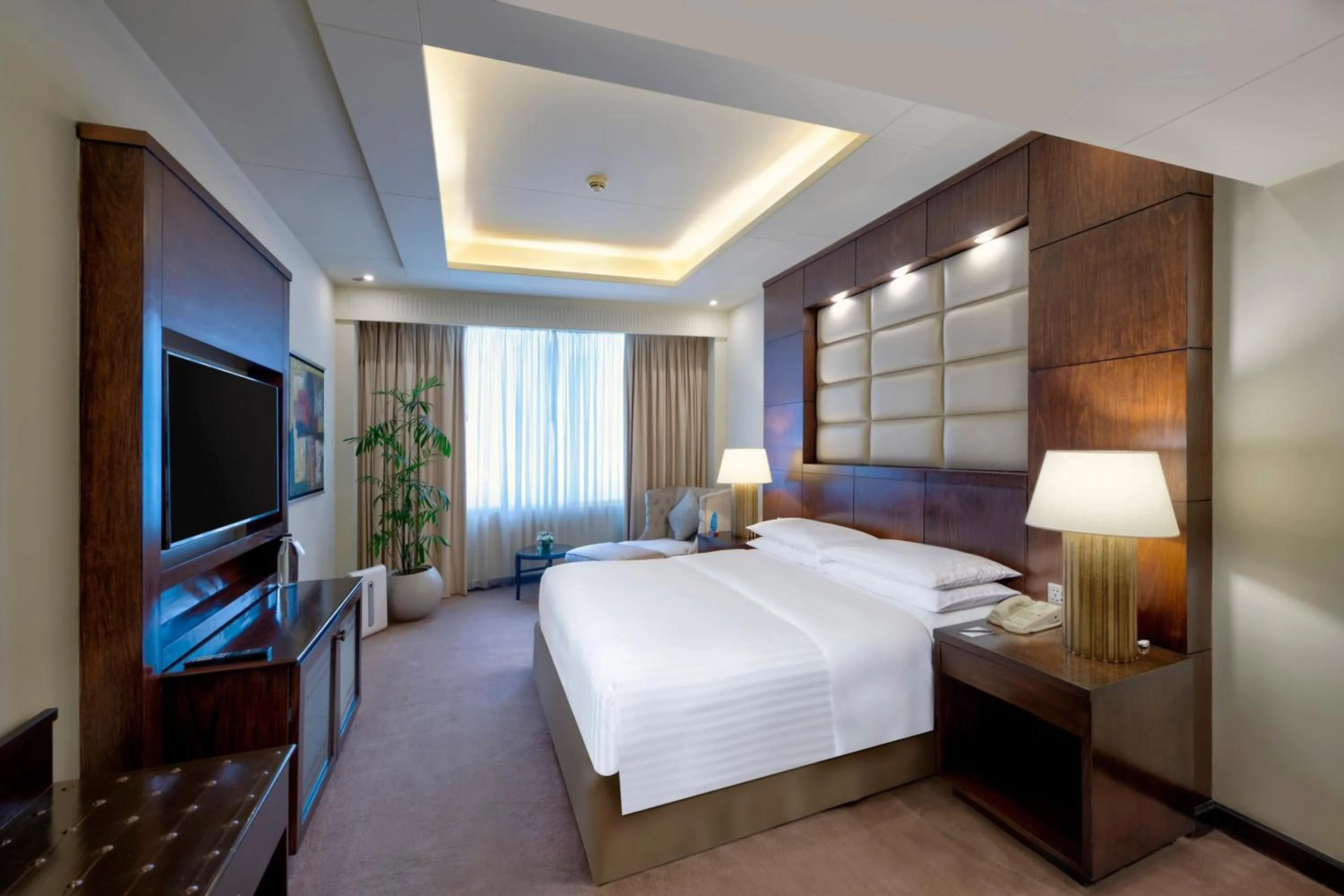 Photo of the whole room, Bed in Islamabad Marriott Hotel