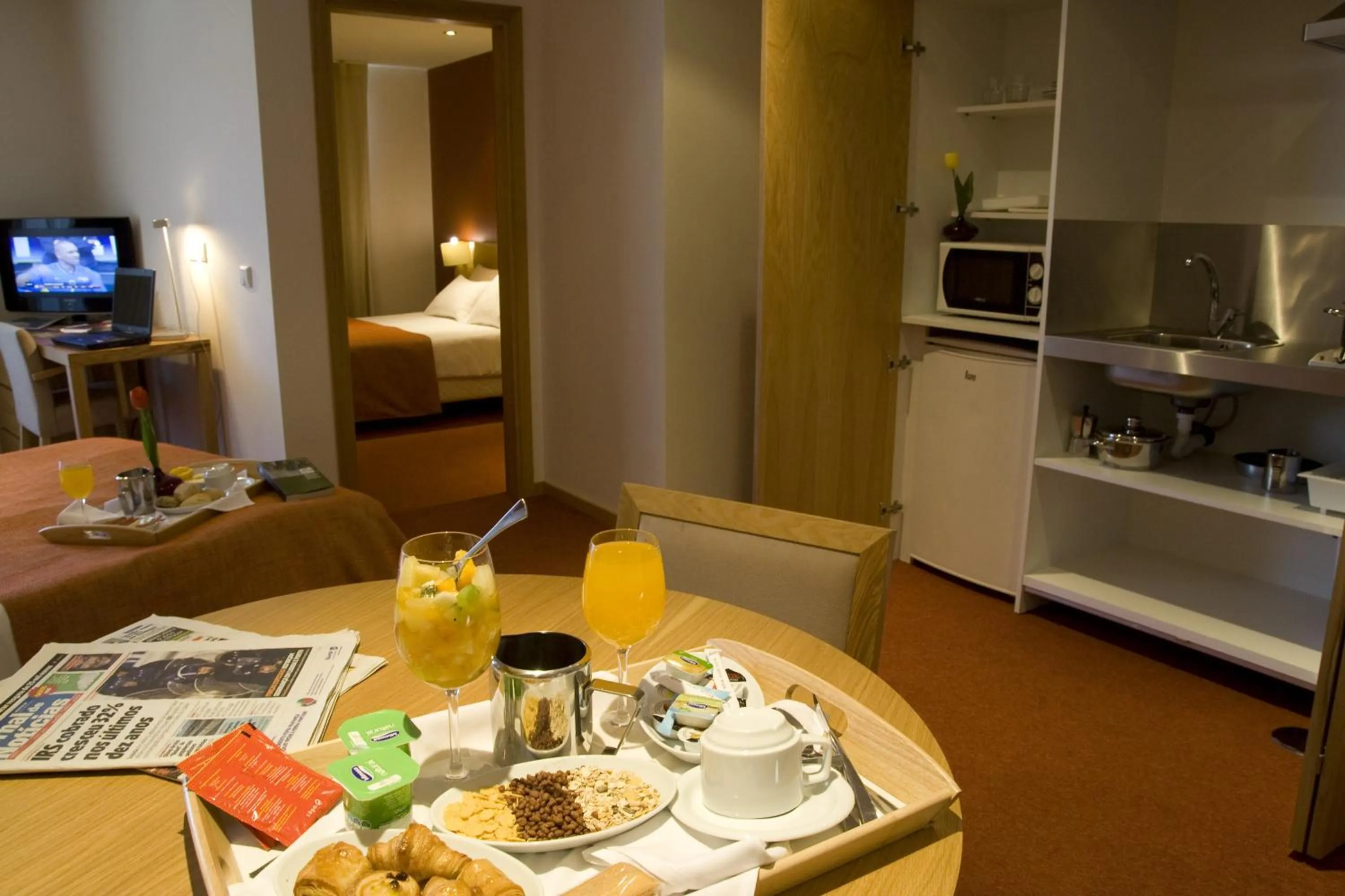 Kitchen or kitchenette in Paredes Hotel Apartamento