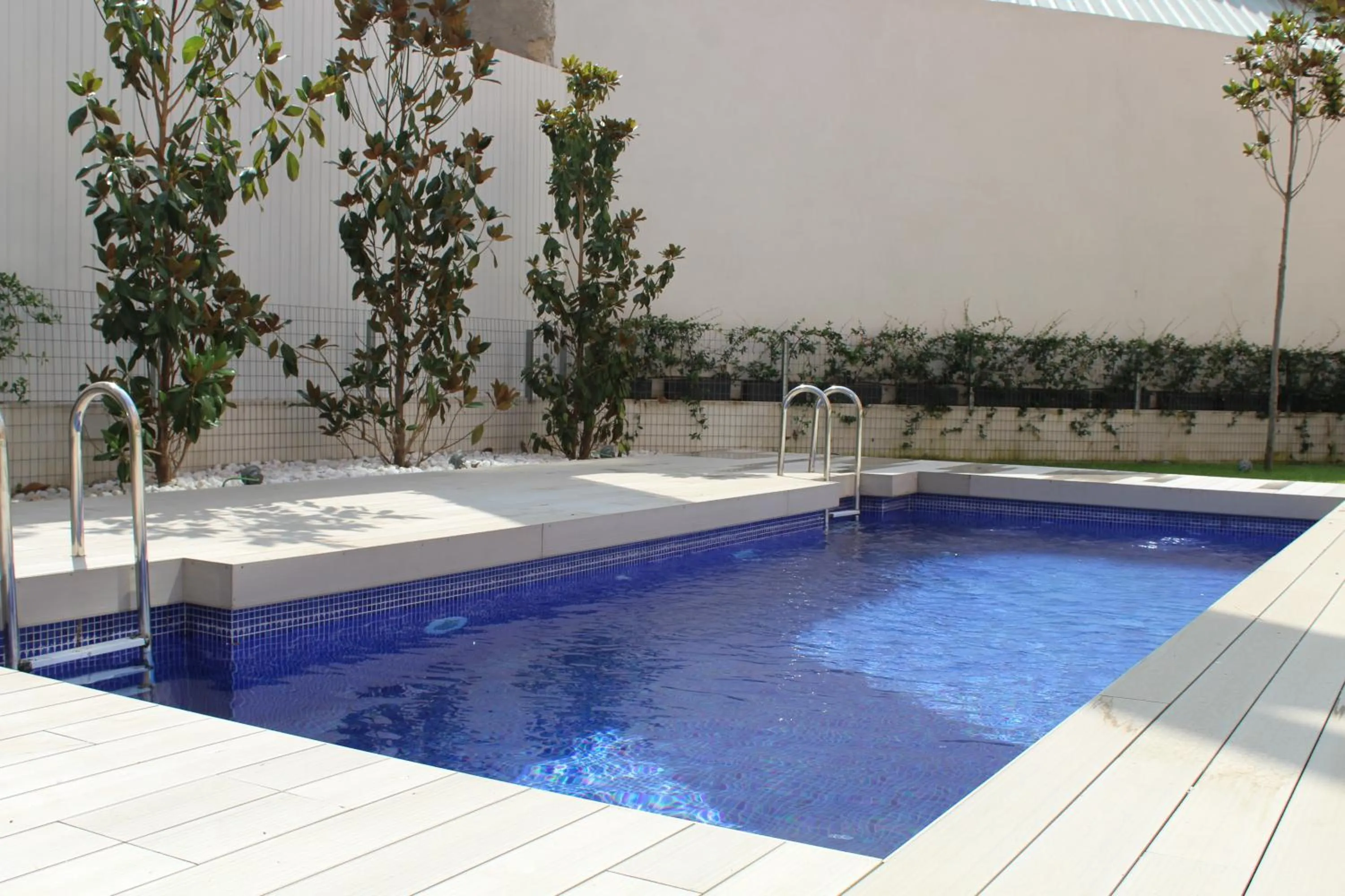 Swimming pool in Hoom Apartments Juan Bravo