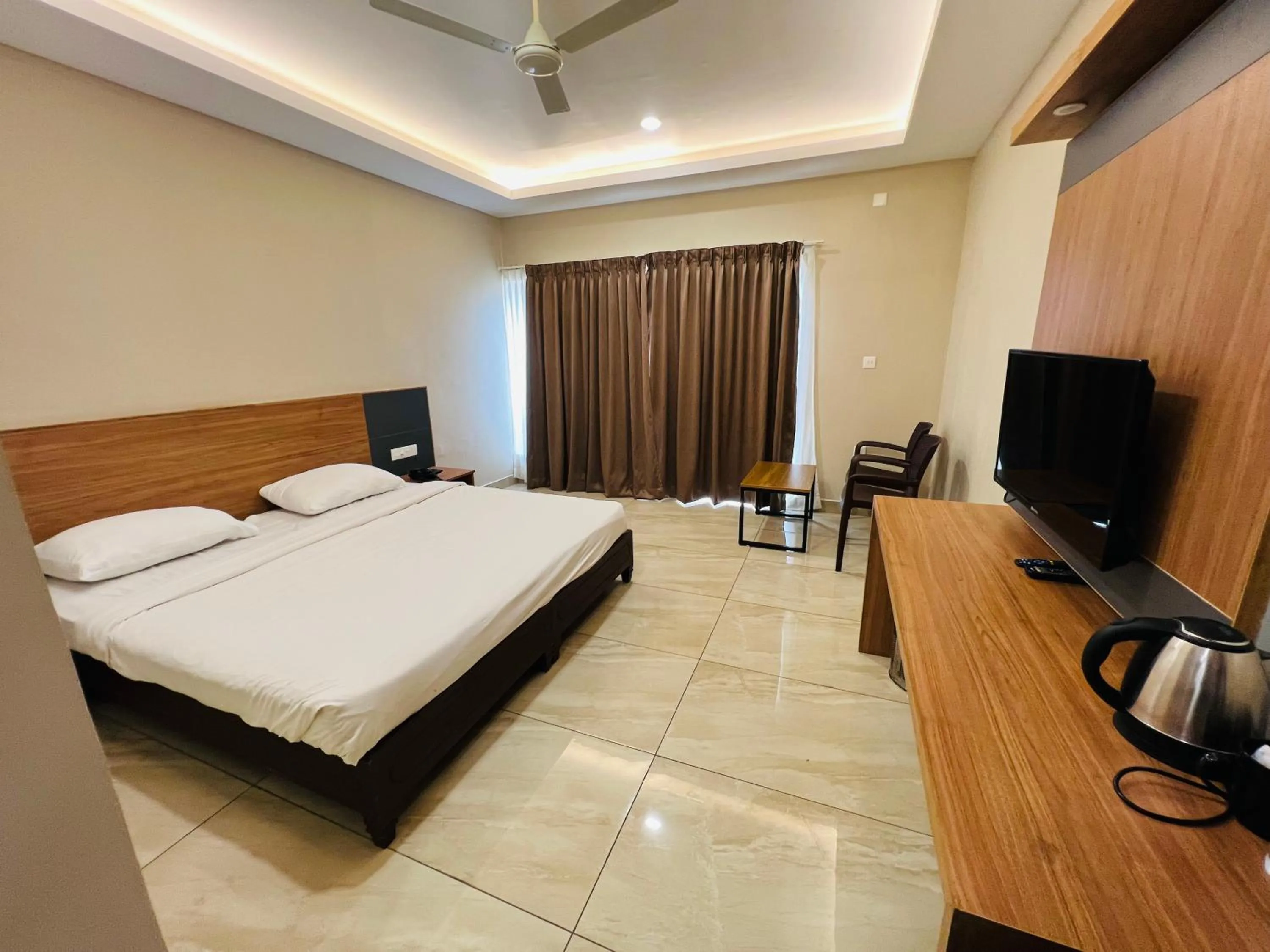 Bed in Ayur County Resort