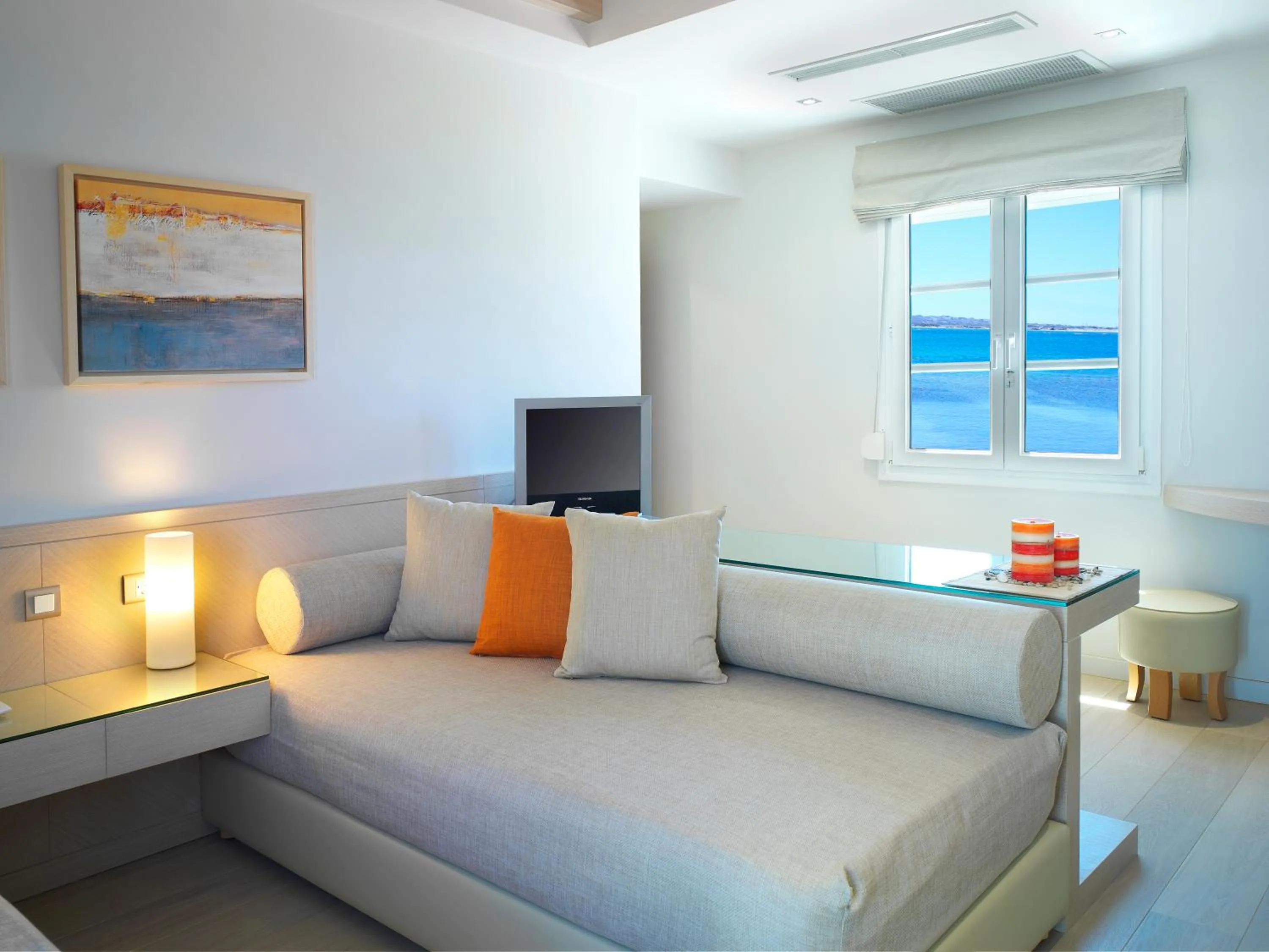 Living room, Bed in Nissaki Beach Hotel