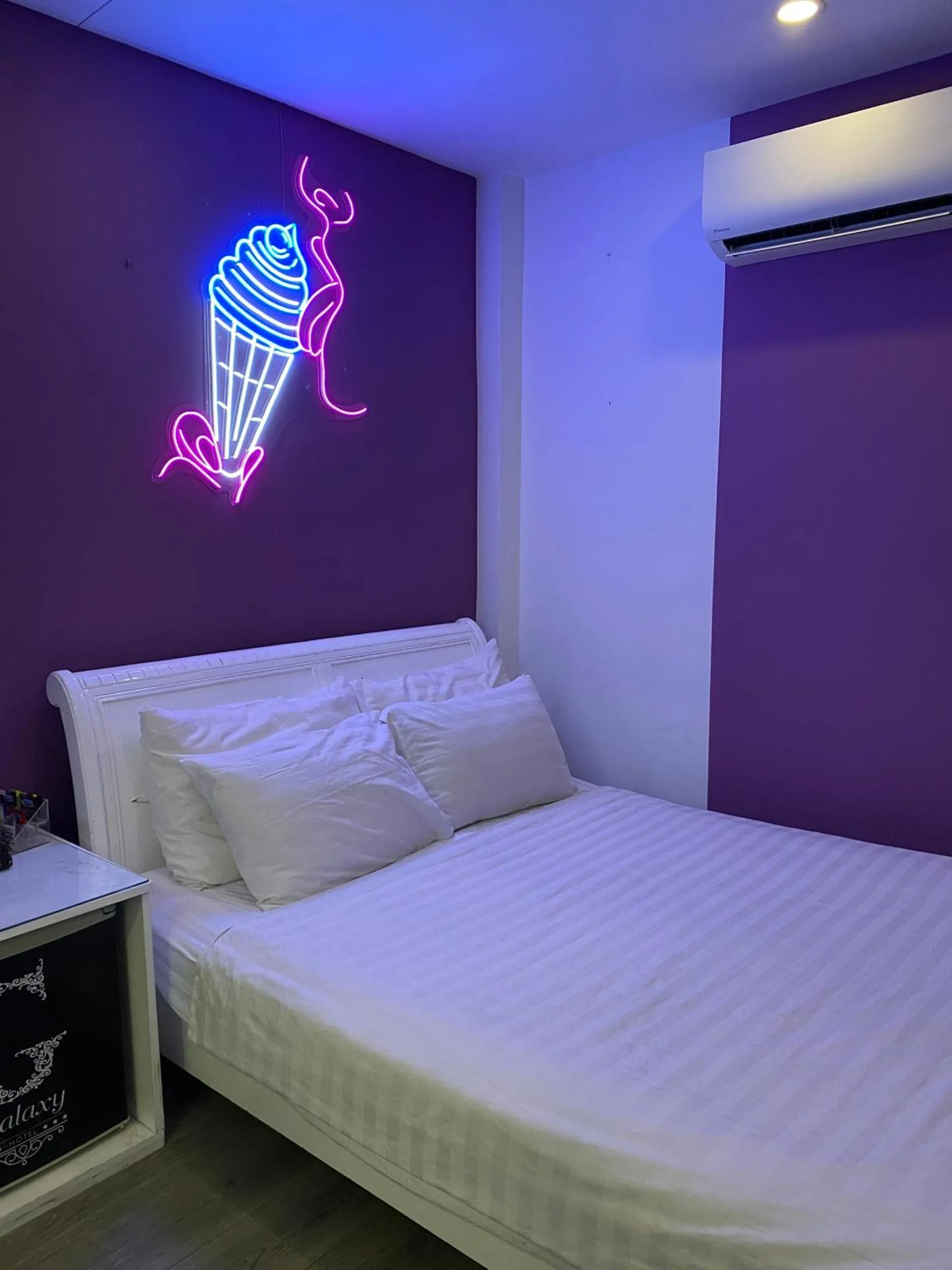Bed in Galaxy Hotel