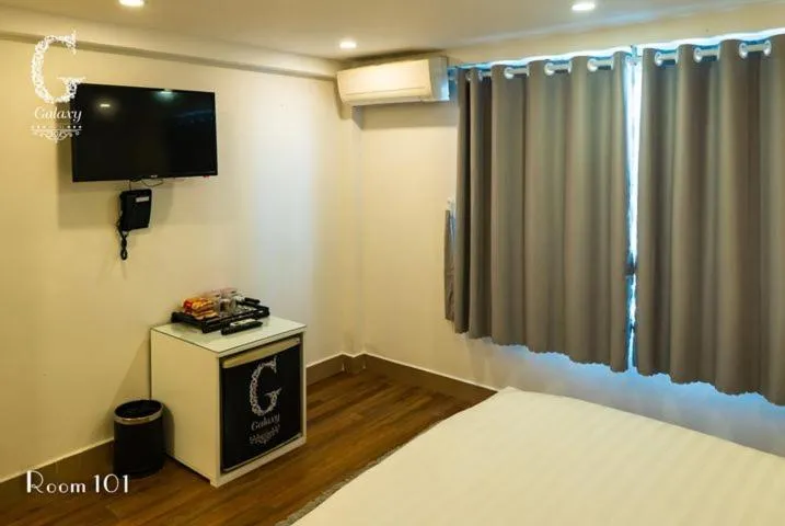 Bed in Galaxy Hotel
