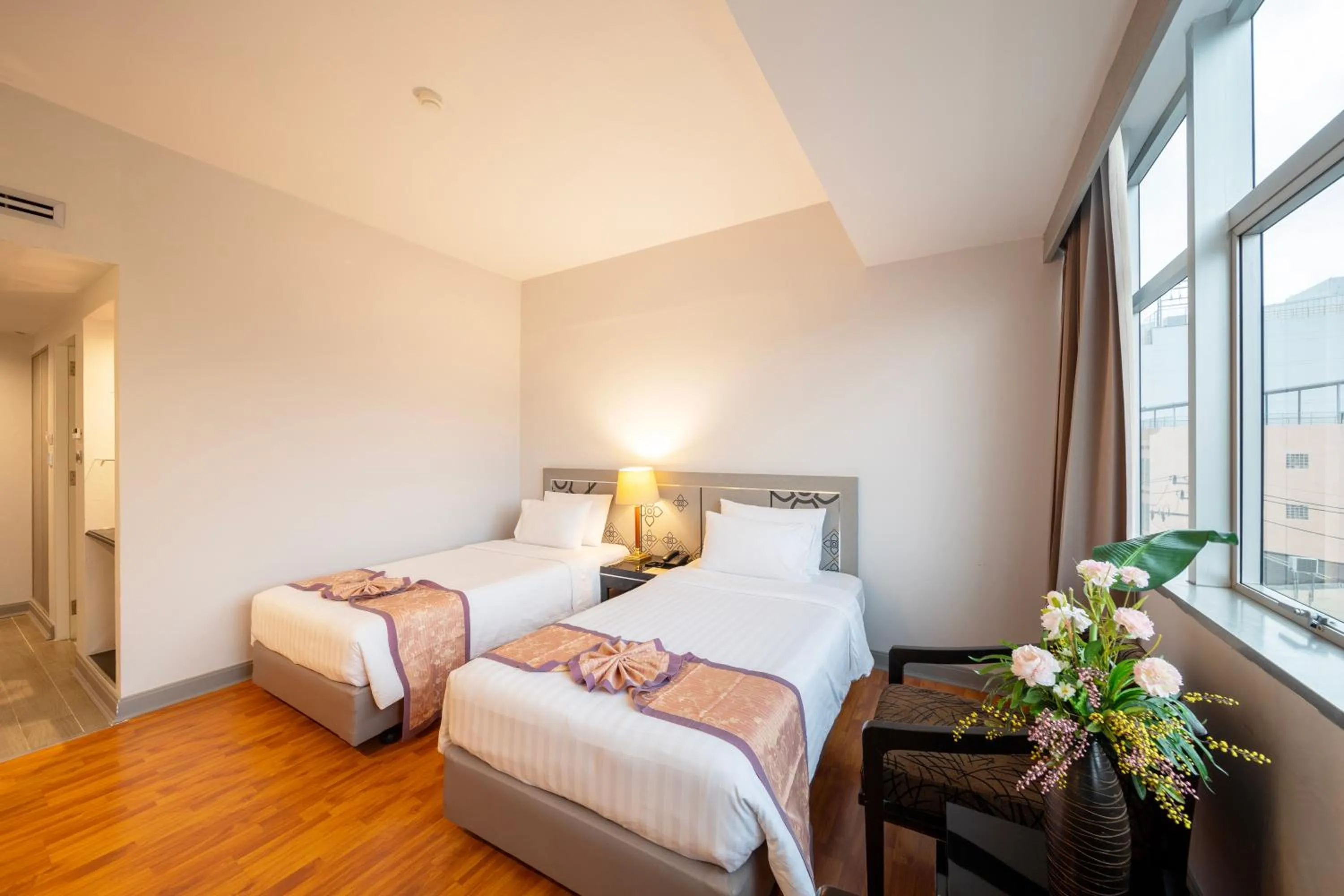 Bed in New Season Hotel