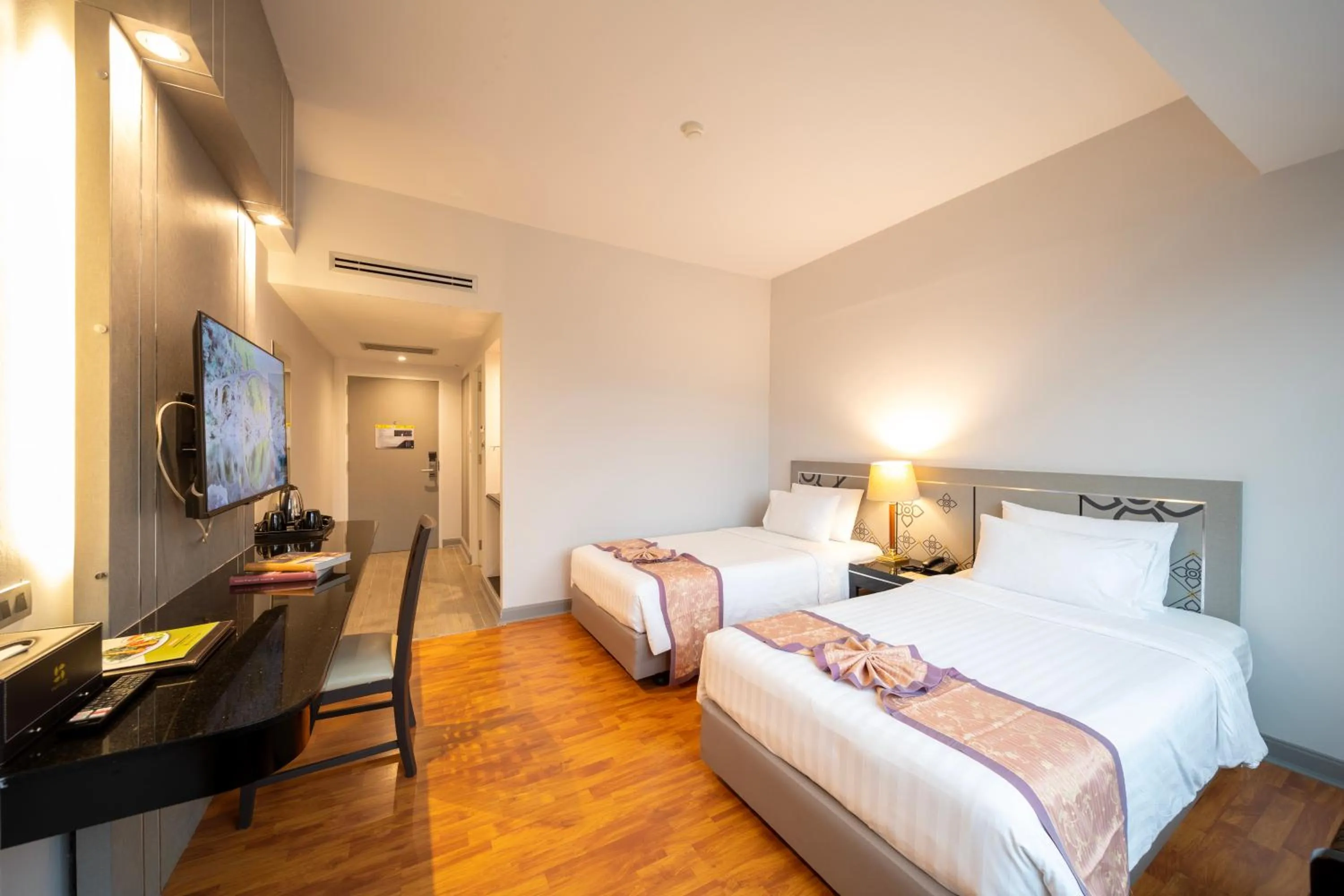 Bed in New Season Hotel