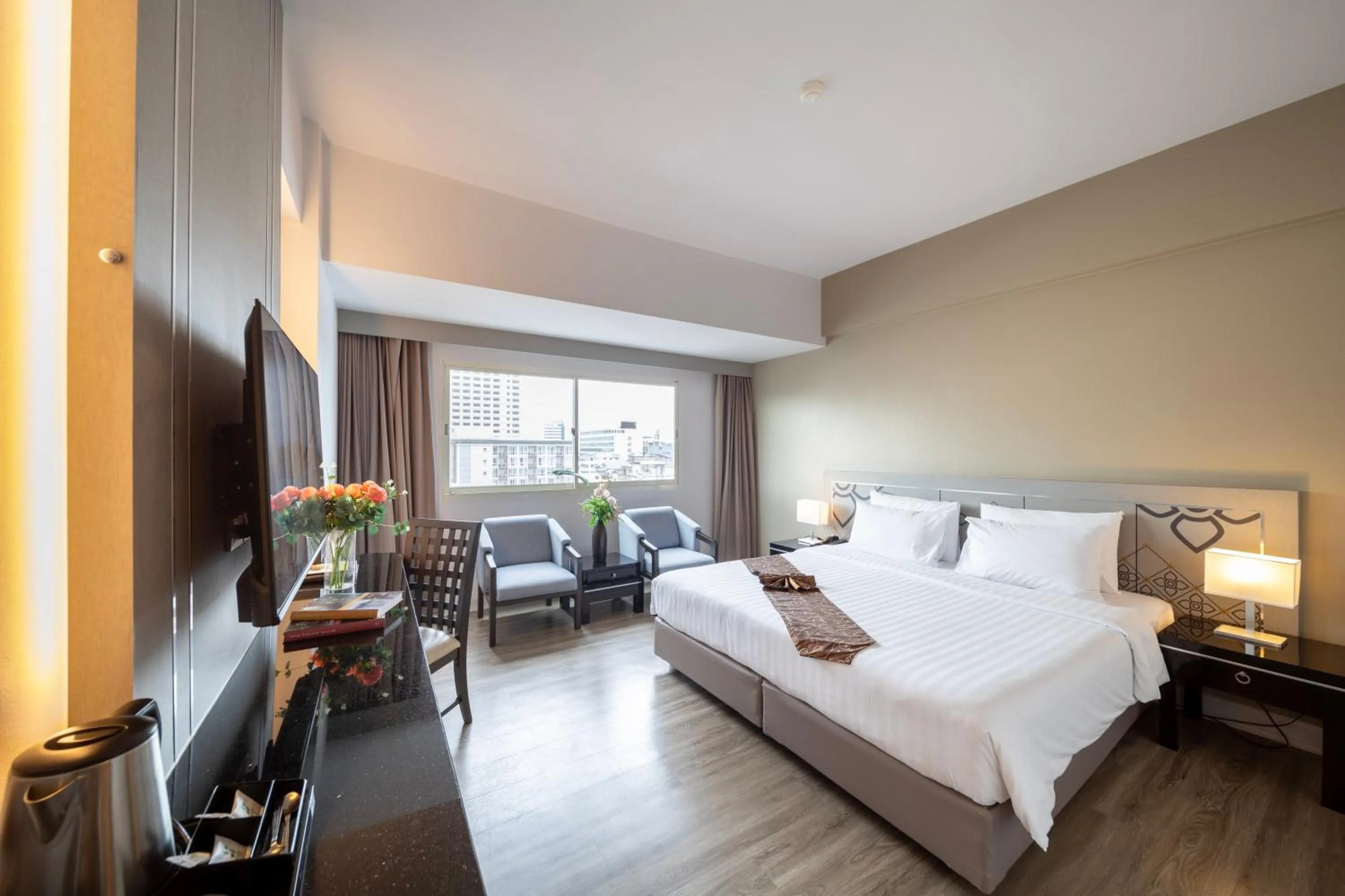 Bed in New Season Hotel