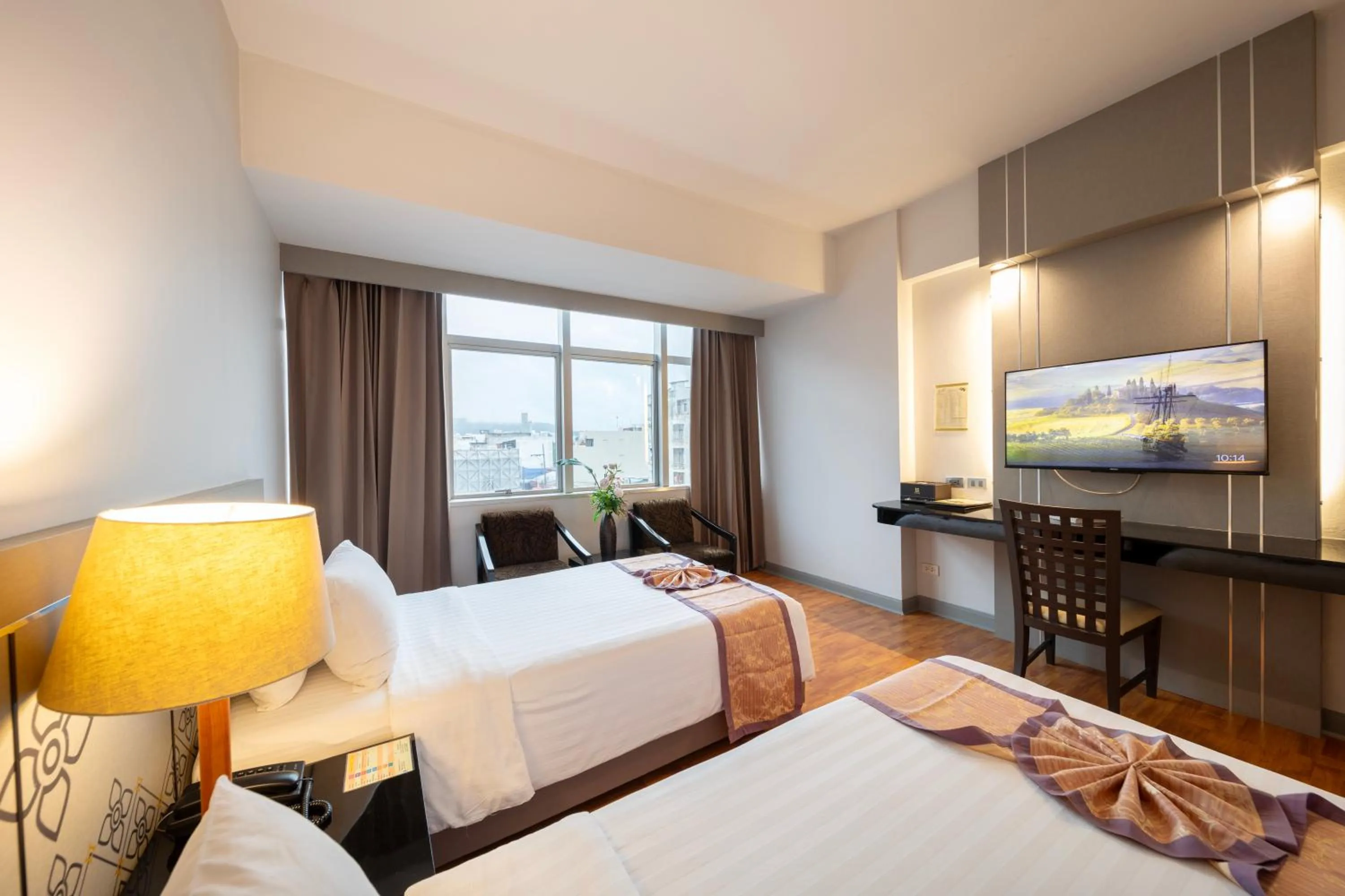 Bed in New Season Hotel