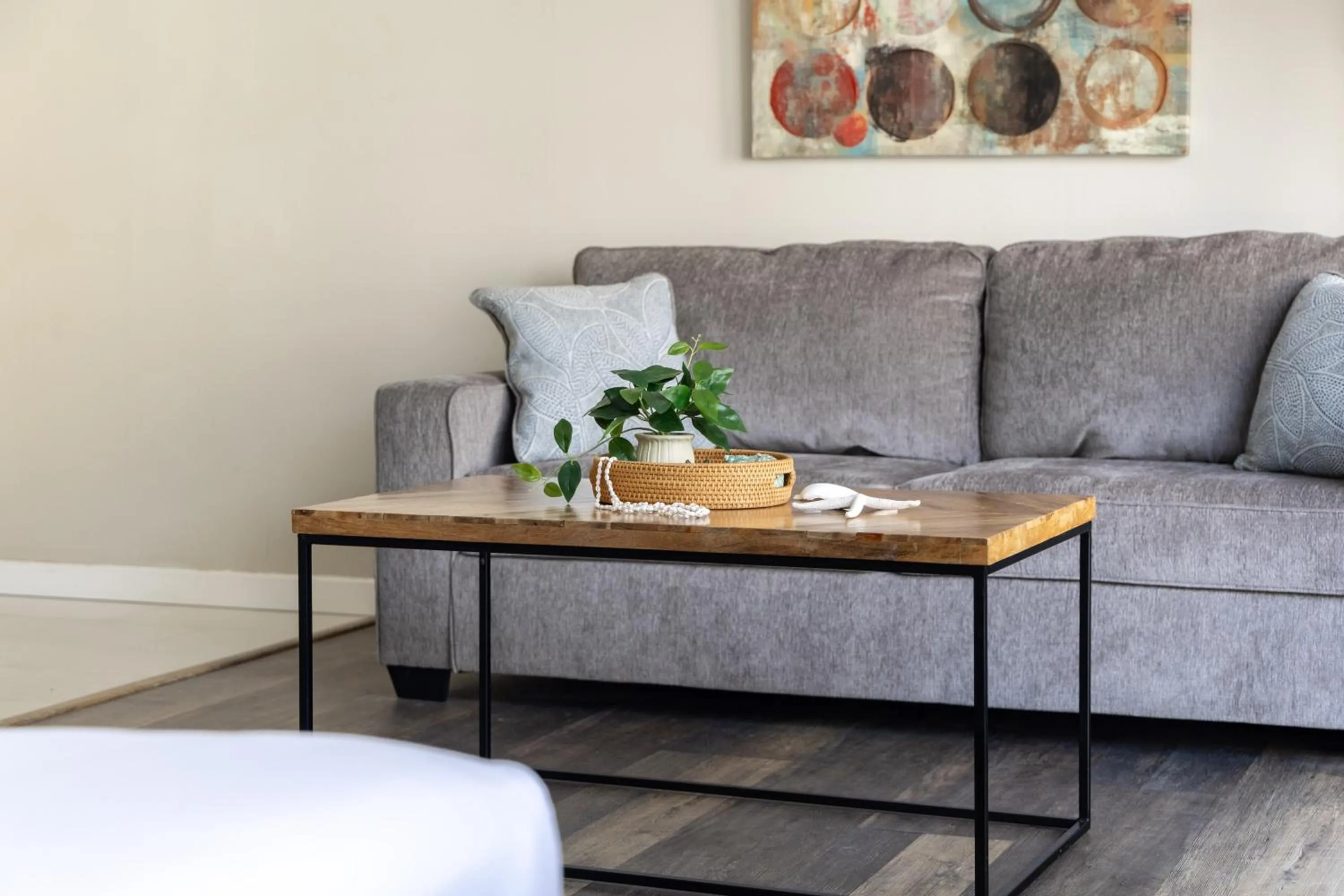 Living room in Renovated Studio with Pool Access at Aloha Surf